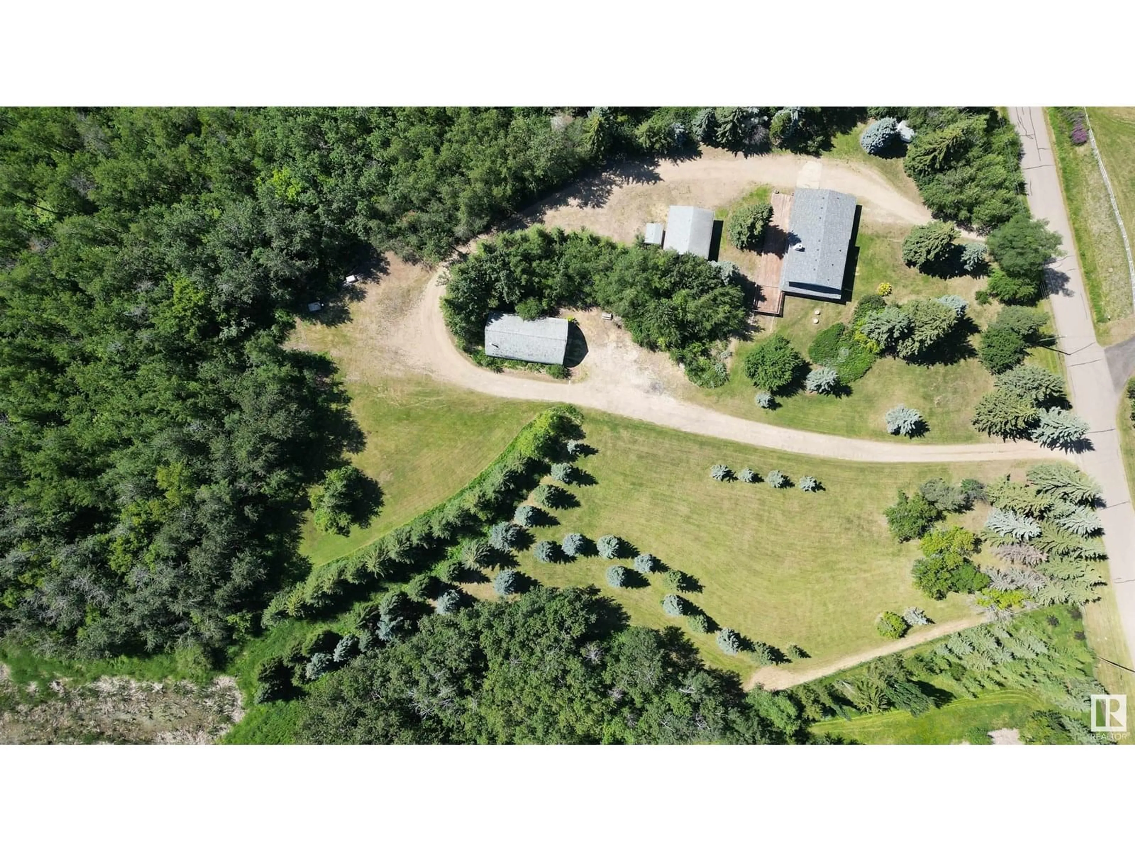 A pic from outside/outdoor area/front of a property/back of a property/a pic from drone, forest/trees view for 61 RGE ROAD 232 RGE, Rural Strathcona County Alberta T8B1C2