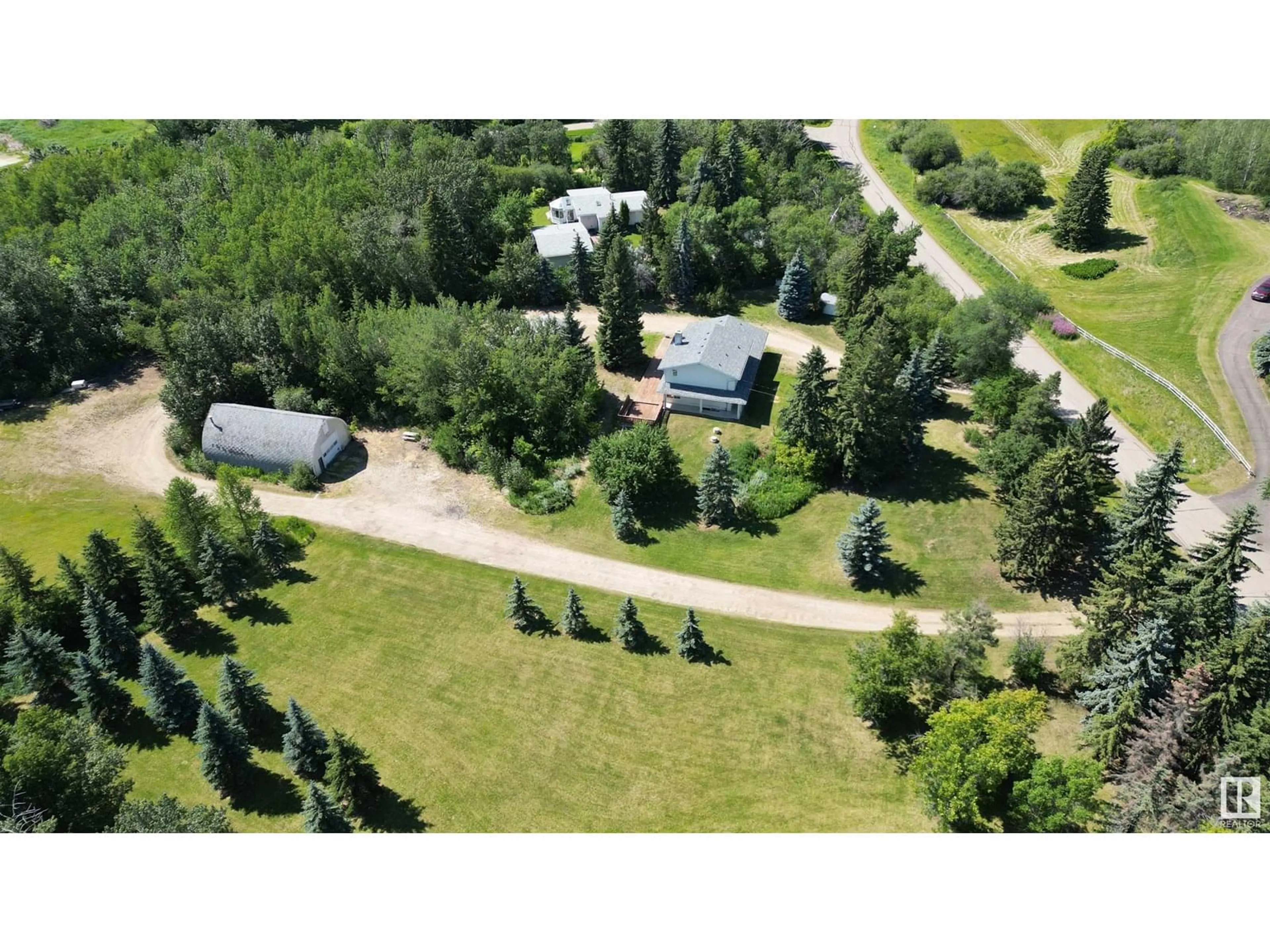 A pic from outside/outdoor area/front of a property/back of a property/a pic from drone, unknown for 61 RGE ROAD 232 RGE, Rural Strathcona County Alberta T8B1C2