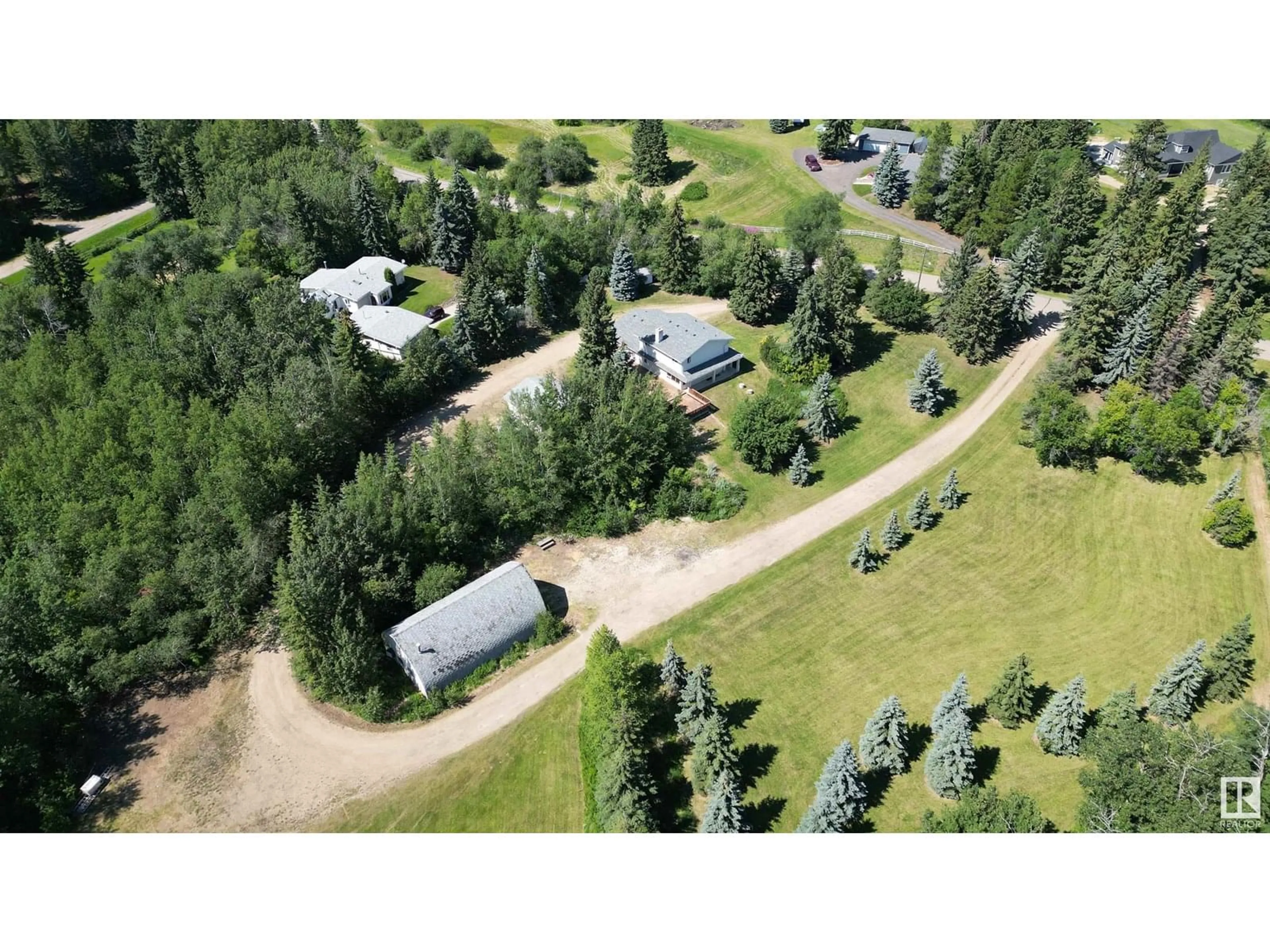 A pic from outside/outdoor area/front of a property/back of a property/a pic from drone, forest/trees view for 61 RGE ROAD 232 RGE, Rural Strathcona County Alberta T8B1C2