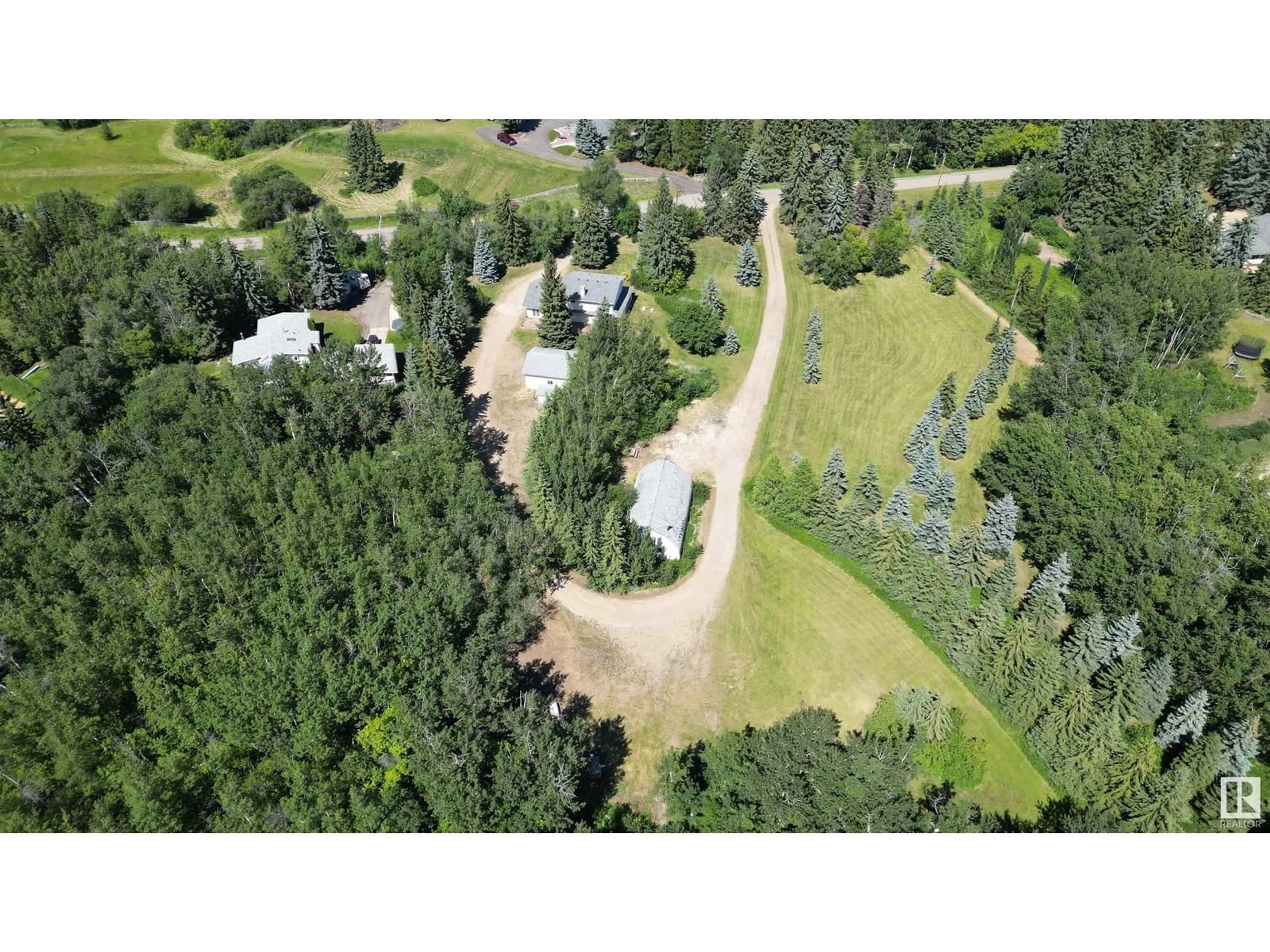 A pic from outside/outdoor area/front of a property/back of a property/a pic from drone, forest/trees view for 61 RGE ROAD 232 RGE, Rural Strathcona County Alberta T8B1C2