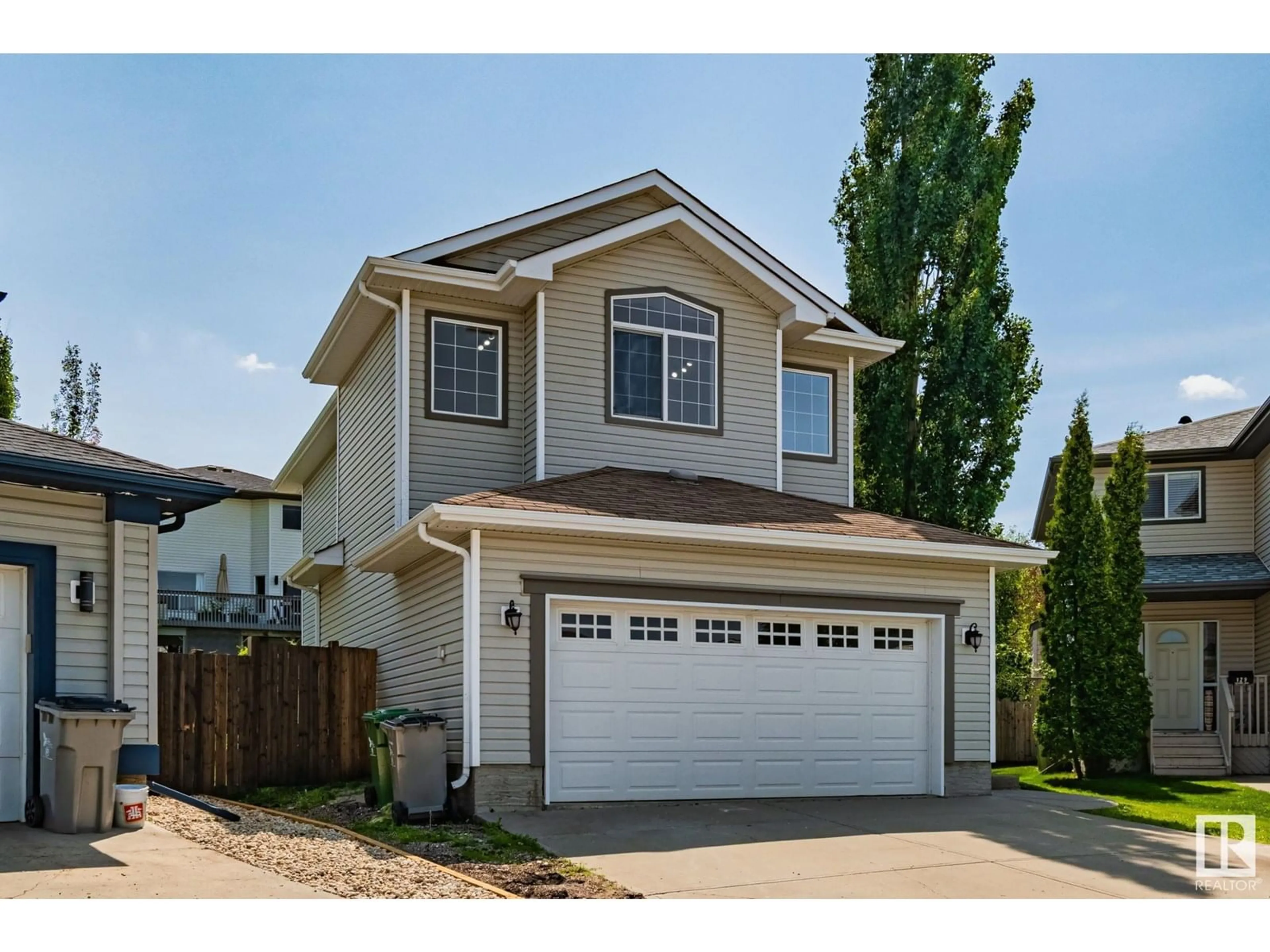Home with vinyl exterior material, street for 130 CHAMPLAIN PL, Beaumont Alberta T4X1V9