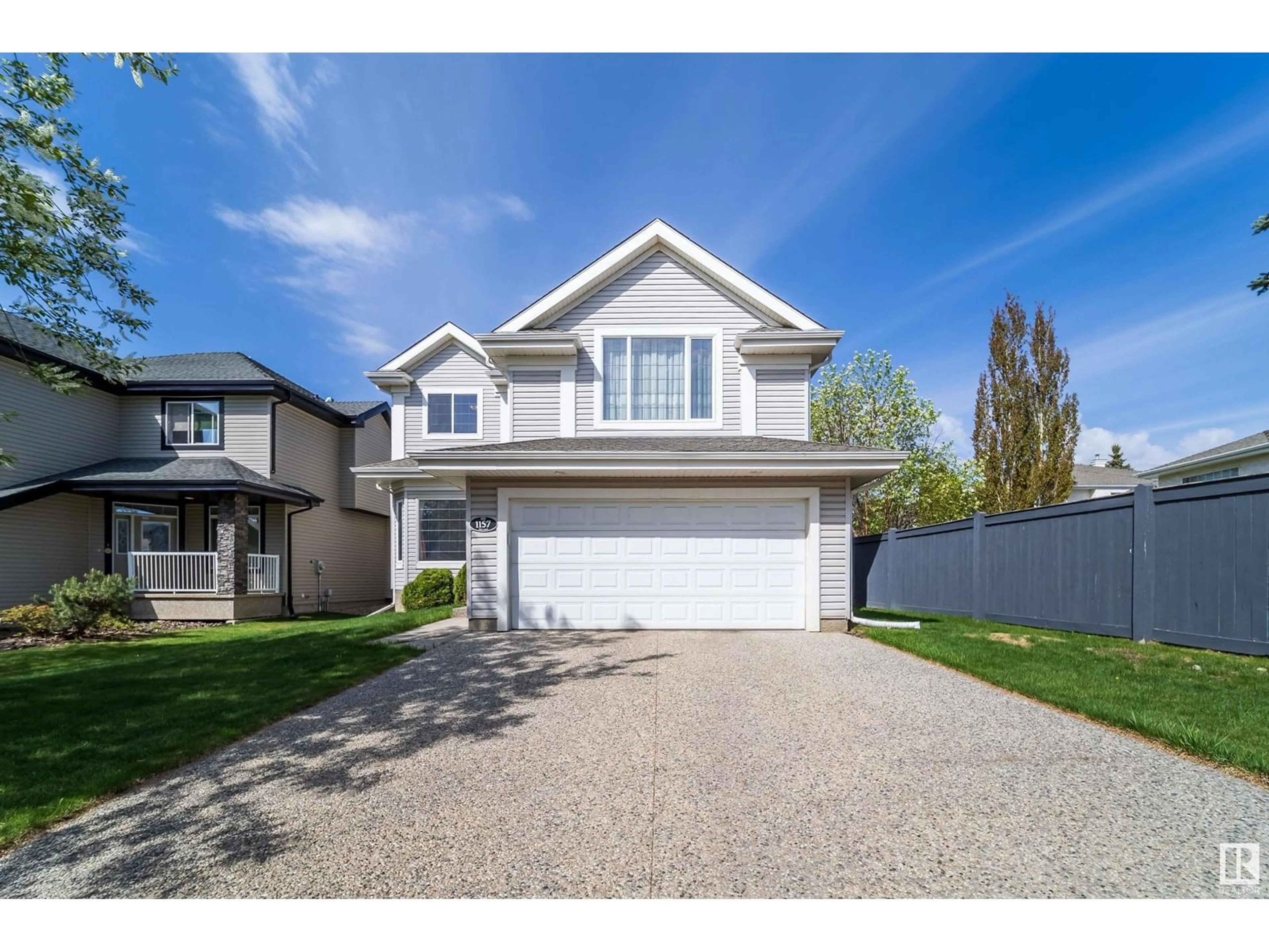 Home with vinyl exterior material, street for 1157 TORY RD, Edmonton Alberta T6R3P2