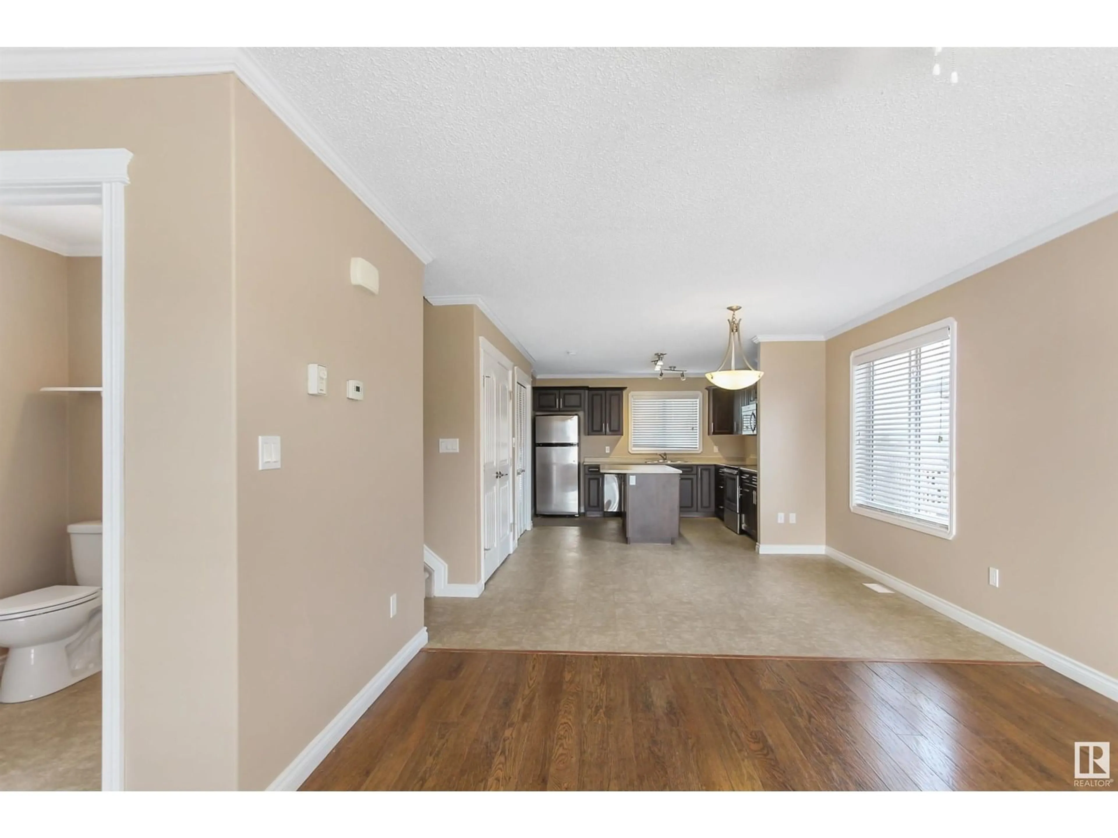 Open concept kitchen, wood/laminate floor for 106 26 ST, Cold Lake Alberta T9M2B5