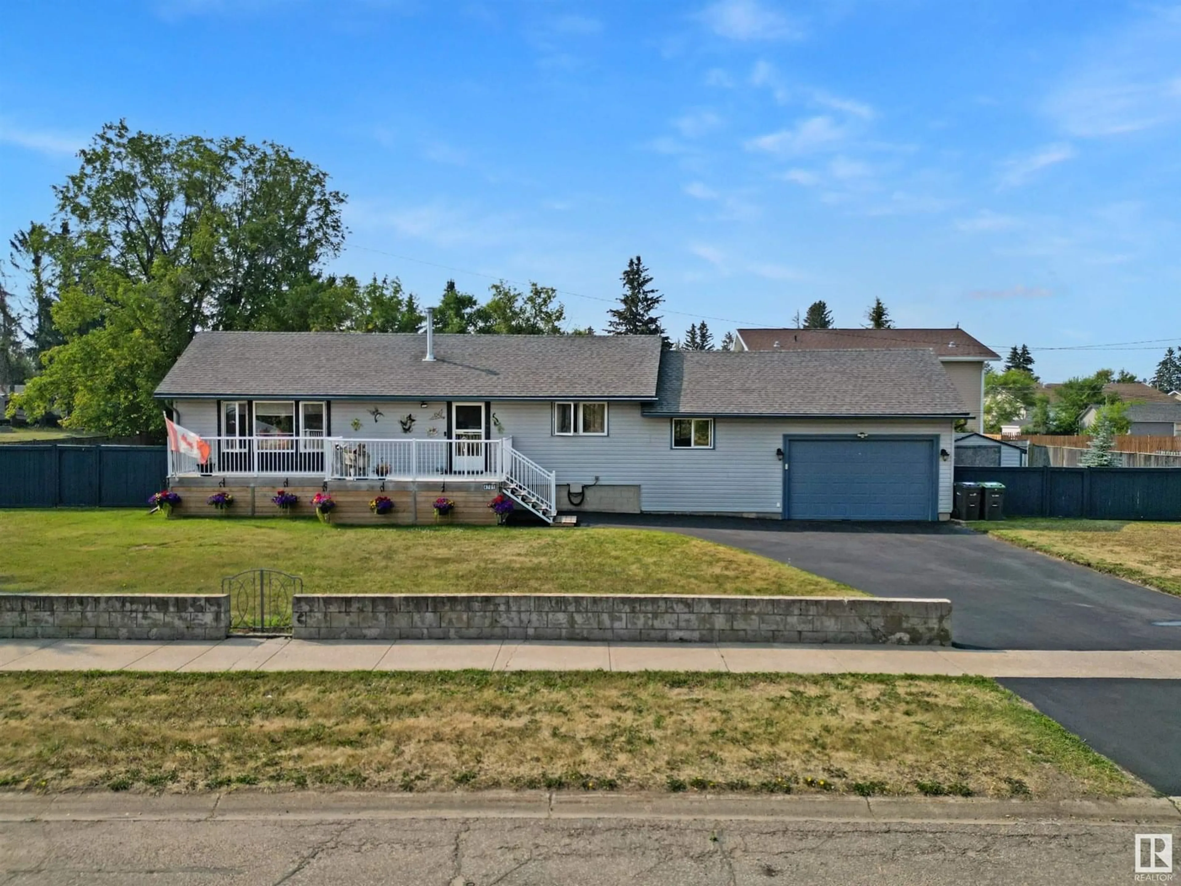 Home with vinyl exterior material, street for 4701 48 AVENUE, Cold Lake Alberta T9M1Y5