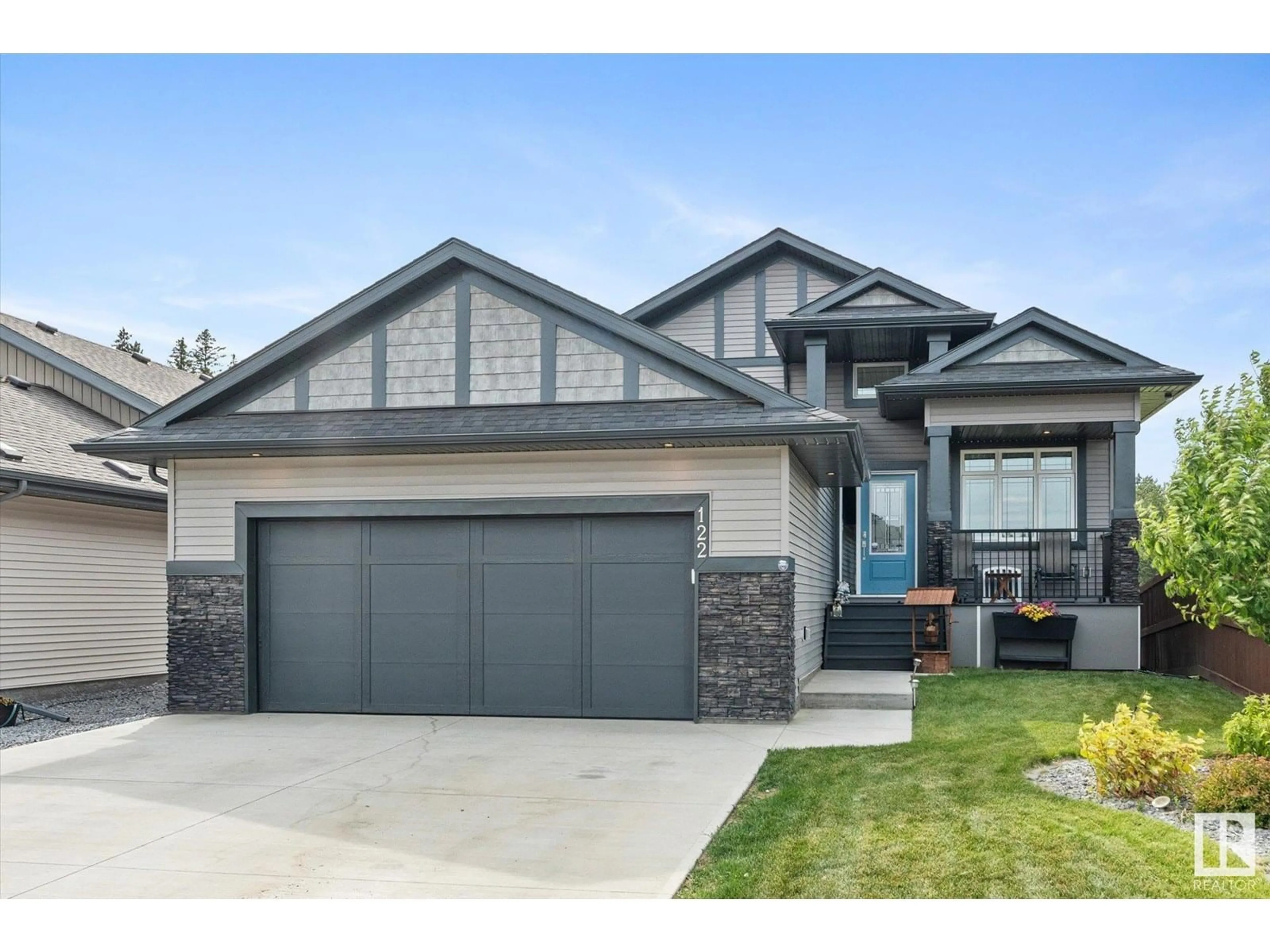 Home with vinyl exterior material, street for 122 HEMINGWAY CR, Spruce Grove Alberta T7X2X1