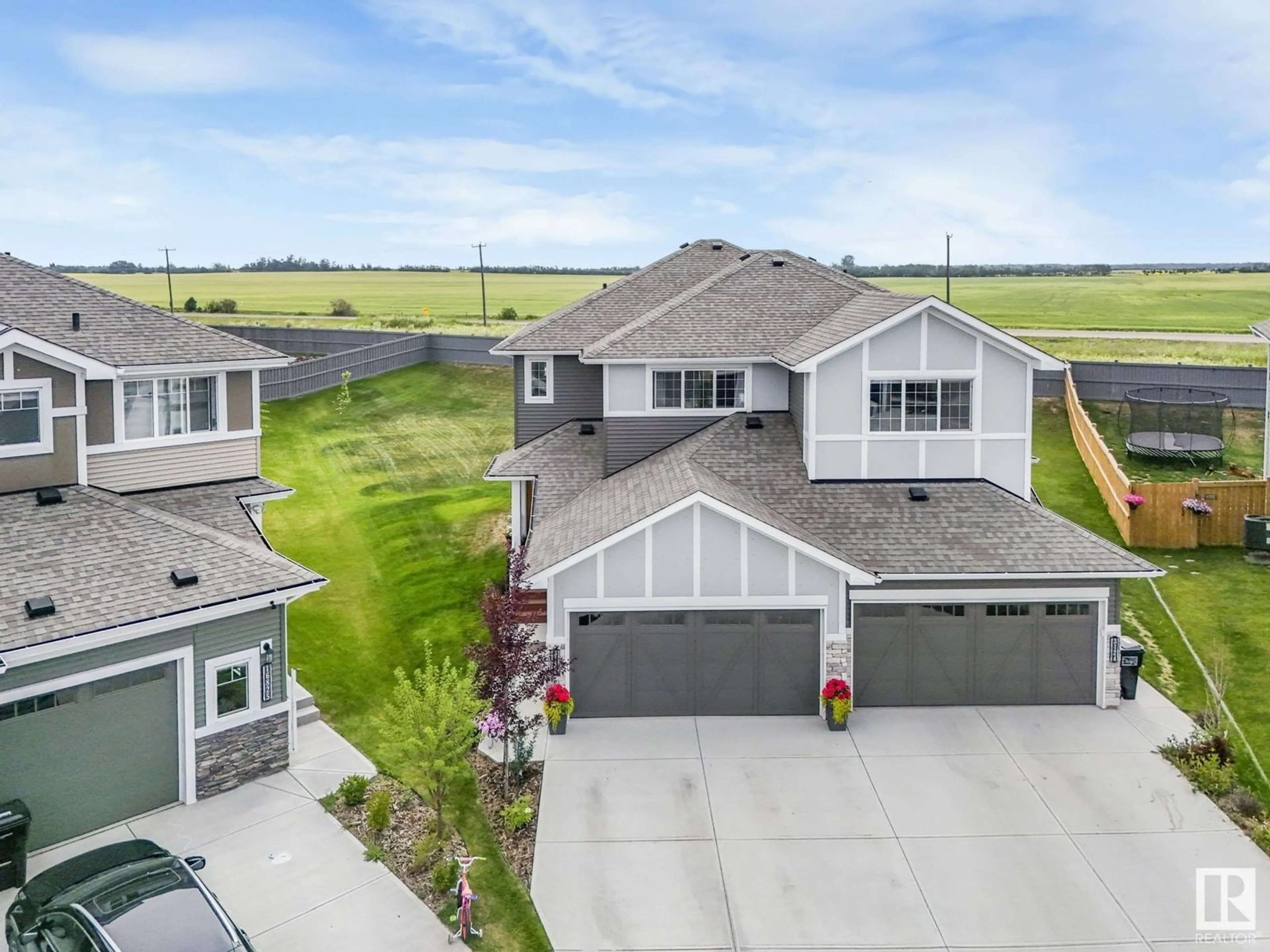 A pic from outside/outdoor area/front of a property/back of a property/a pic from drone, unknown for SW - 3126 169 ST, Edmonton Alberta T6W5A4