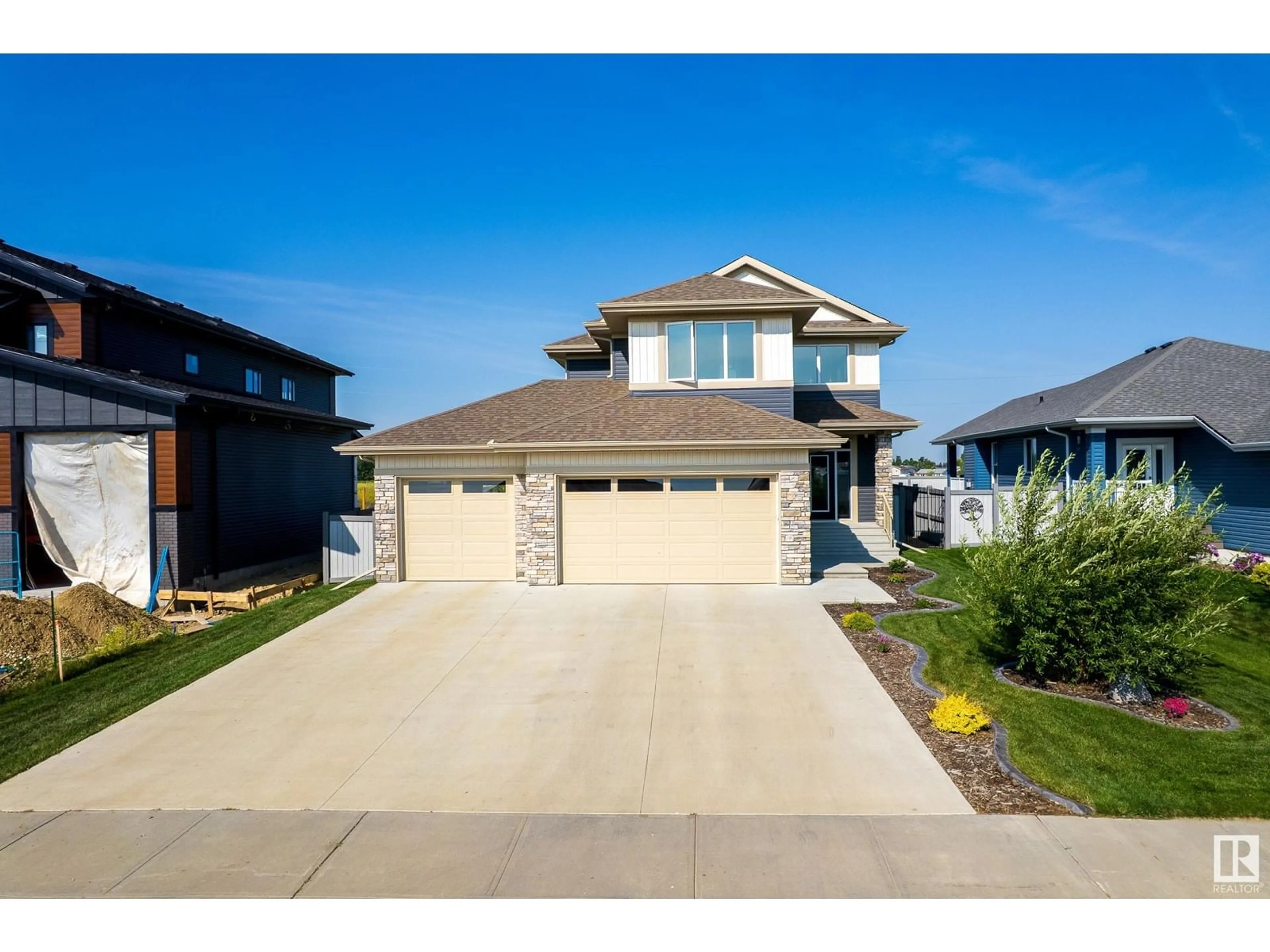 Home with vinyl exterior material, street for 115 EASTVIEW DR, Morinville Alberta T8R1T3