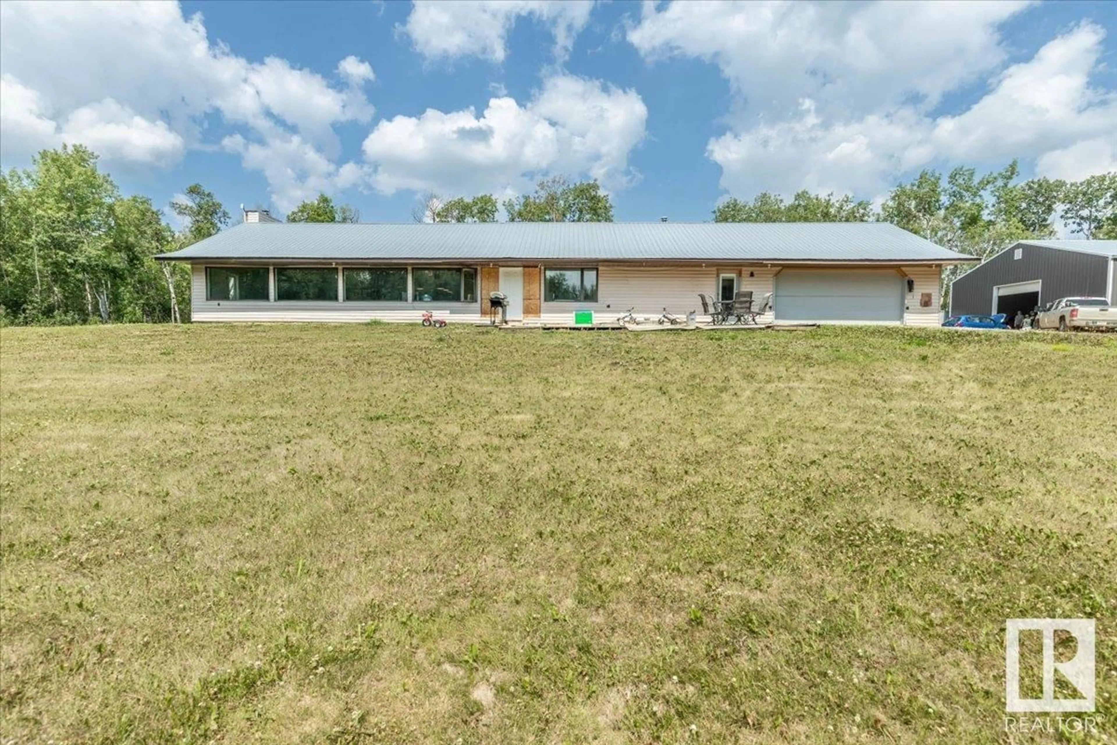 A pic from outside/outdoor area/front of a property/back of a property/a pic from drone, unknown for 49464 RGE RD 200, Rural Camrose County Alberta T0B2M1