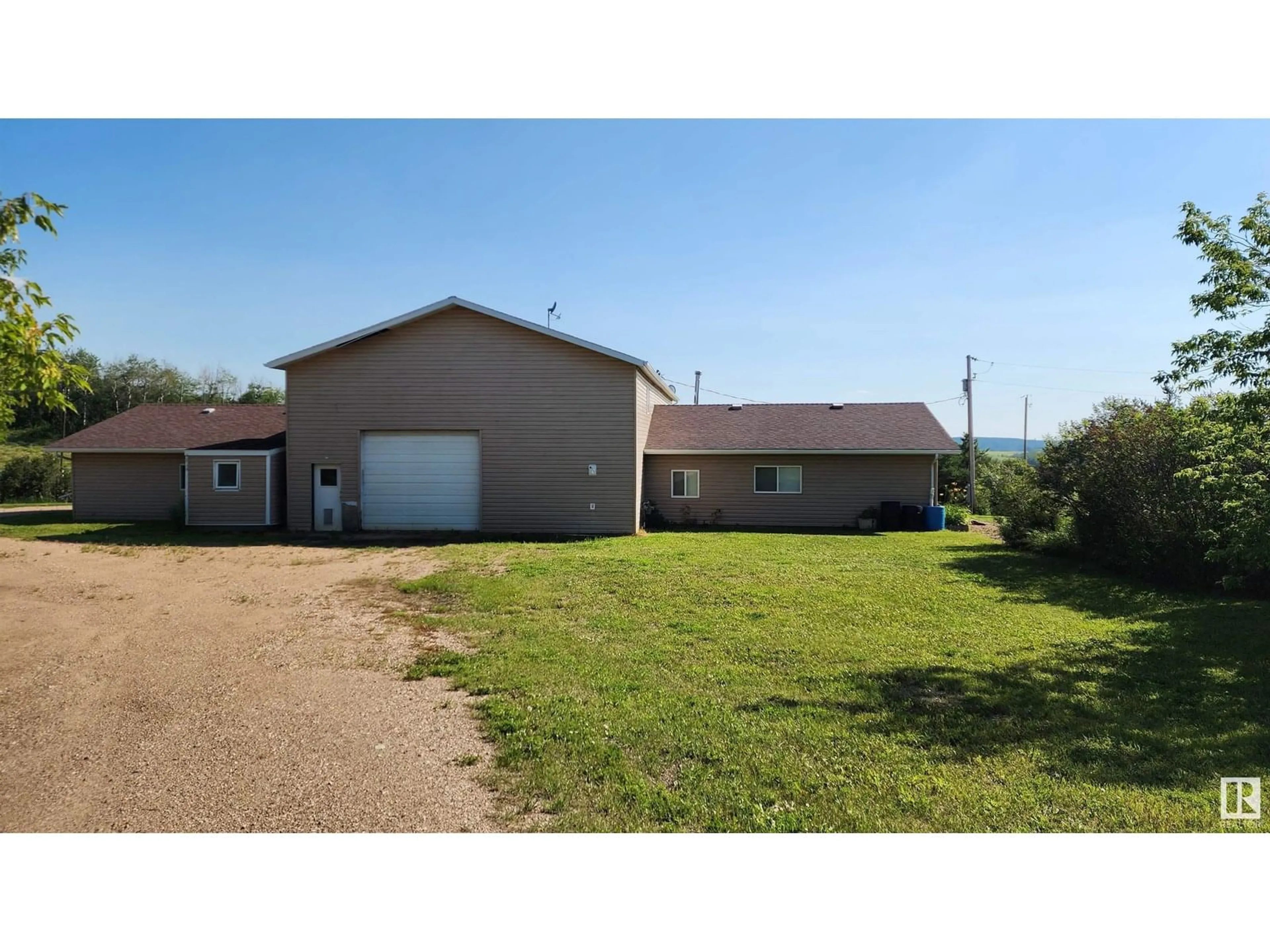 A pic from outside/outdoor area/front of a property/back of a property/a pic from drone, building for 56131 RG RD 82, Rural St. Paul County Alberta T0A1A0