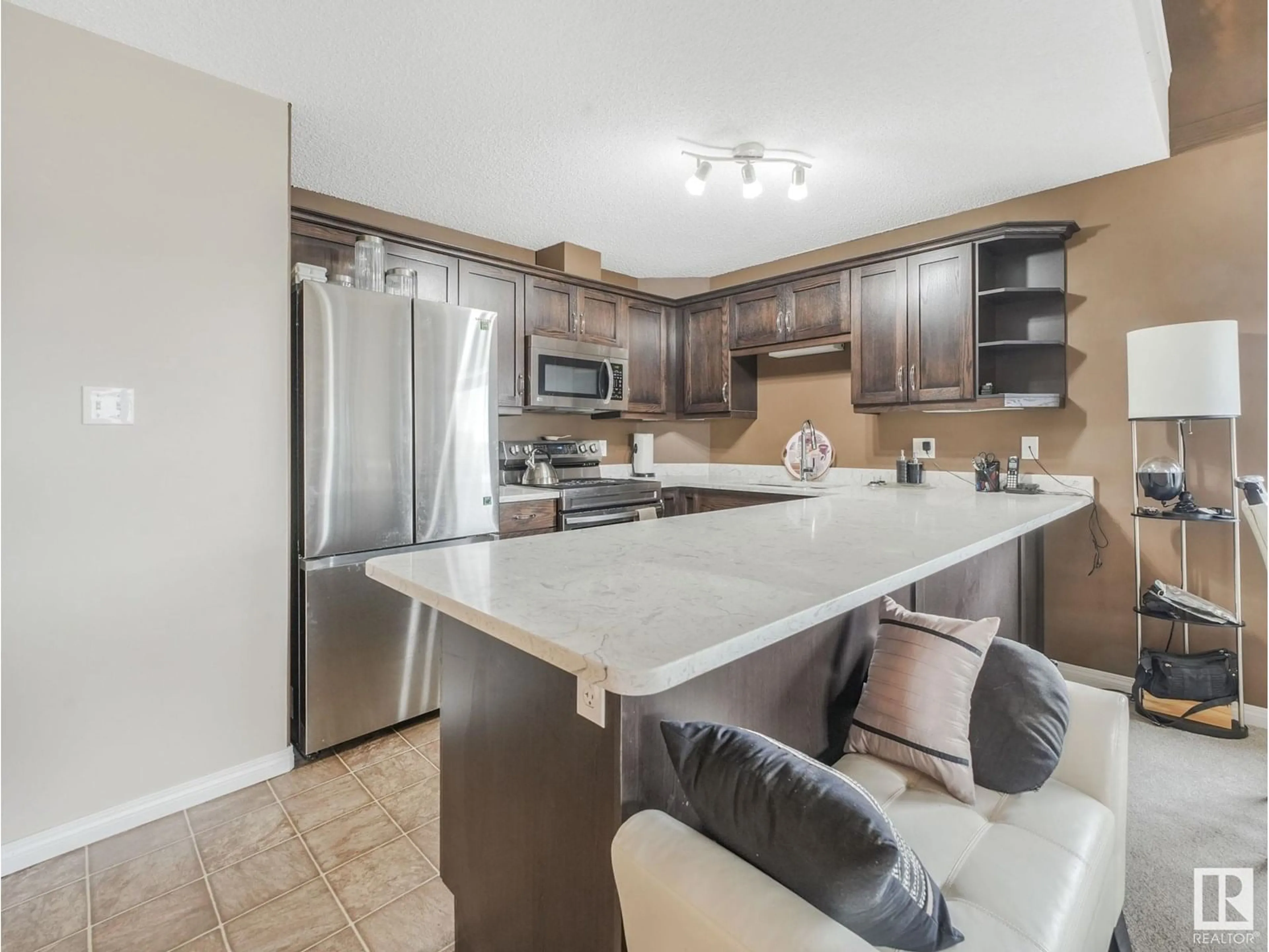 Open concept kitchen, ceramic/tile floor for #435 - 1520 HAMMOND GATE, Edmonton Alberta T6M0J4