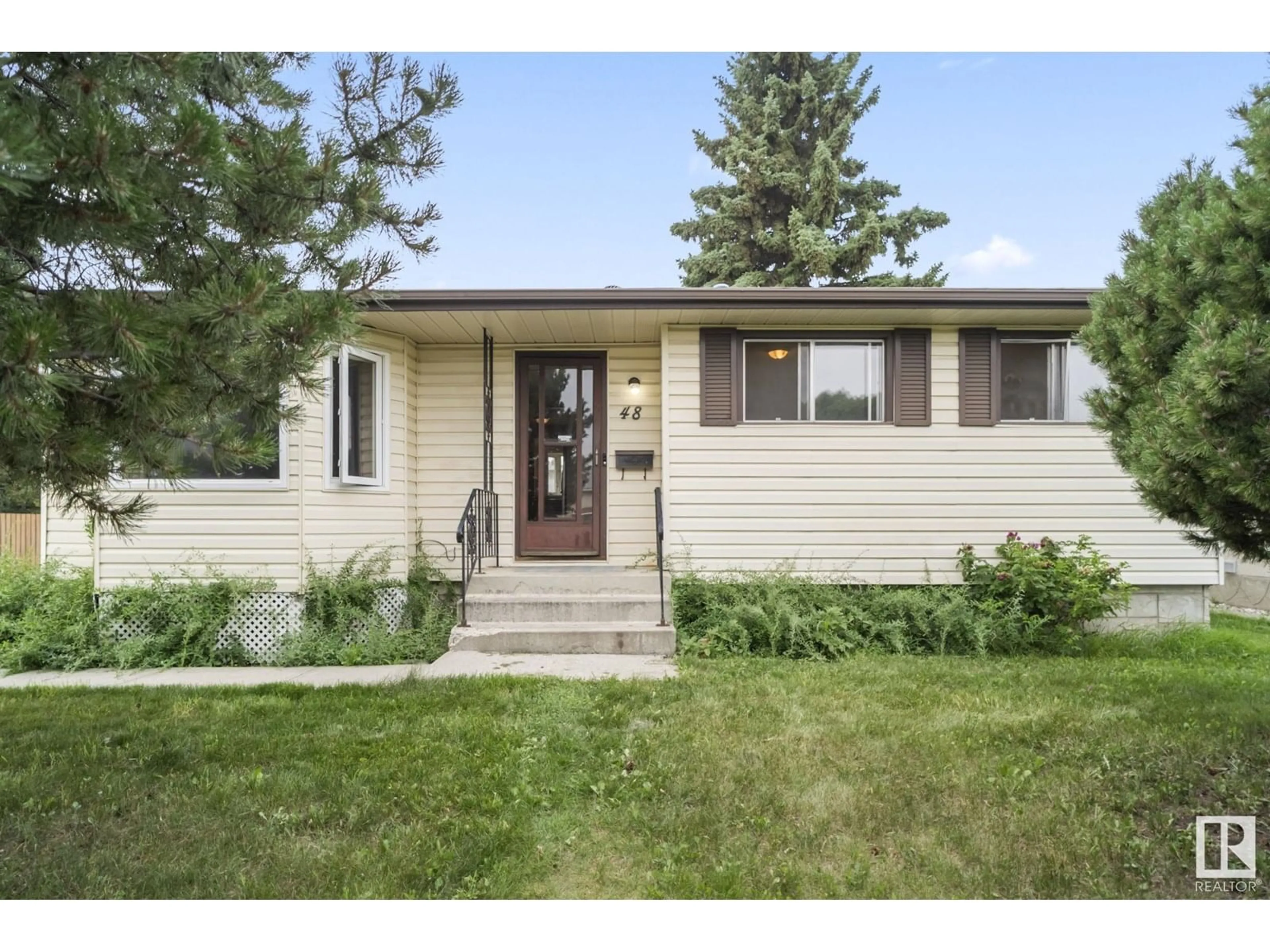 Home with vinyl exterior material, street for 48 STEELE CR, Edmonton Alberta T5A1G3