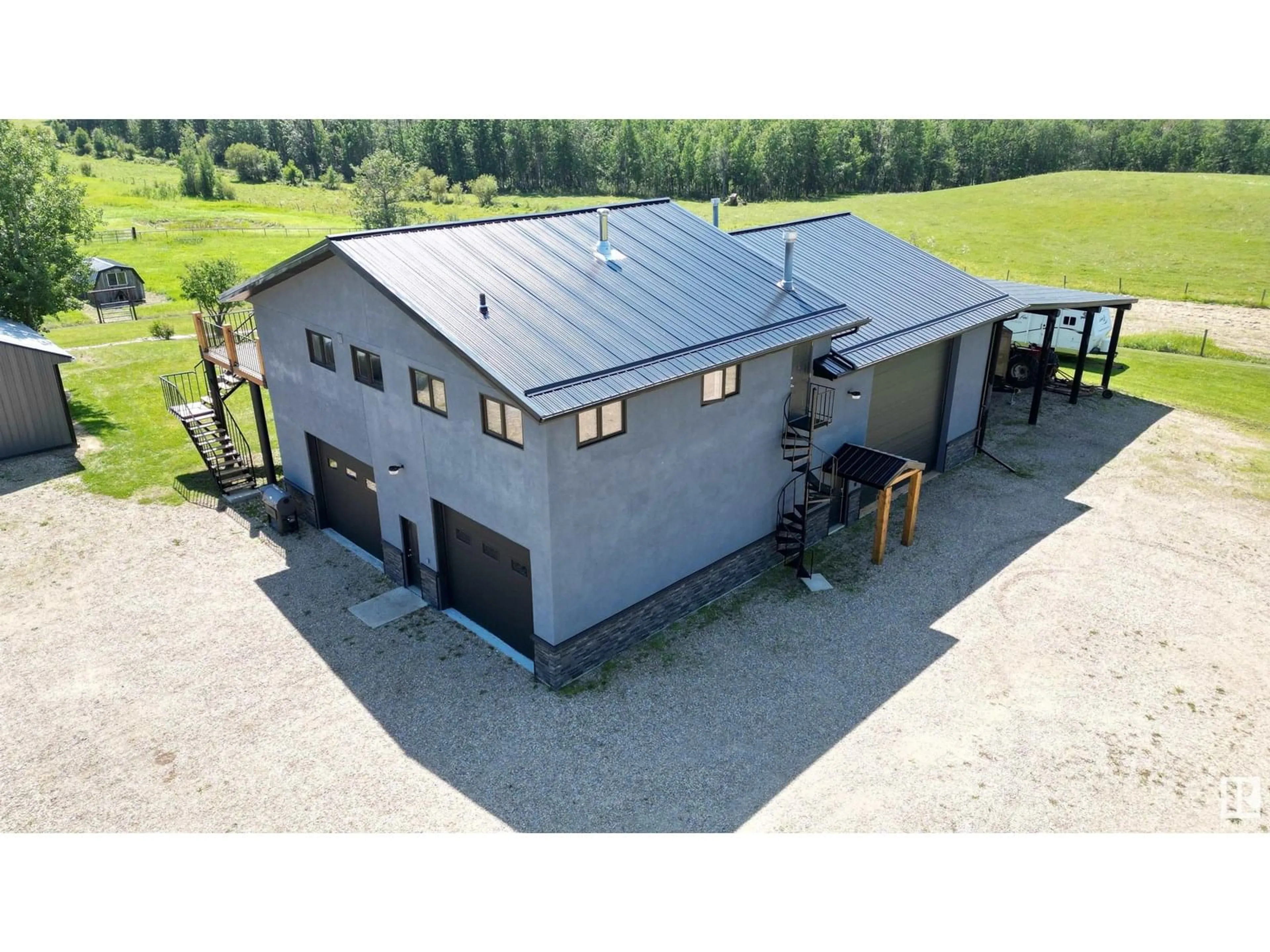 A pic from outside/outdoor area/front of a property/back of a property/a pic from drone, building for 6415 TWP ROAD 540, Rural Parkland County Alberta T0E0S0