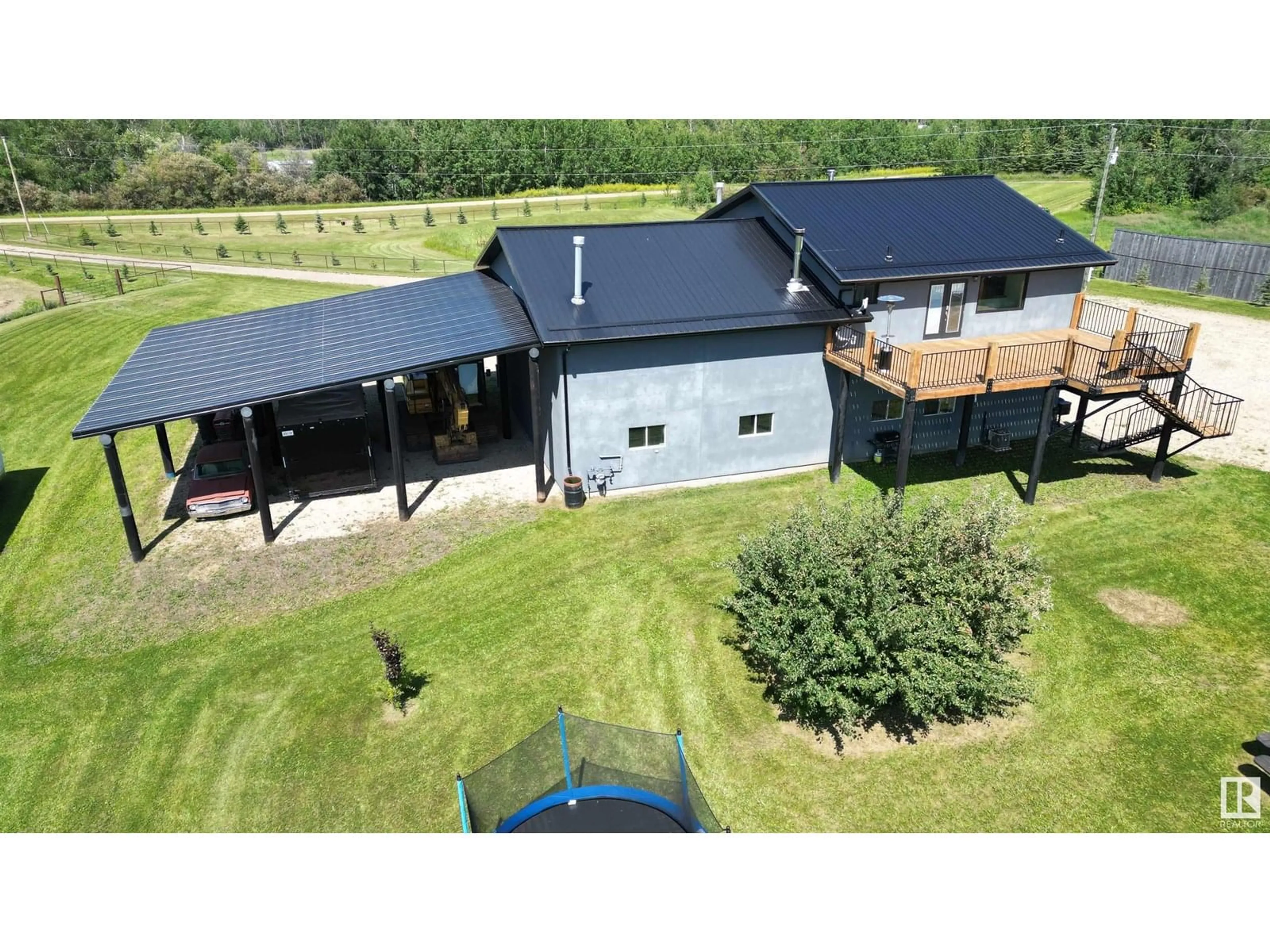 A pic from outside/outdoor area/front of a property/back of a property/a pic from drone, building for 6415 TWP ROAD 540, Rural Parkland County Alberta T0E0S0