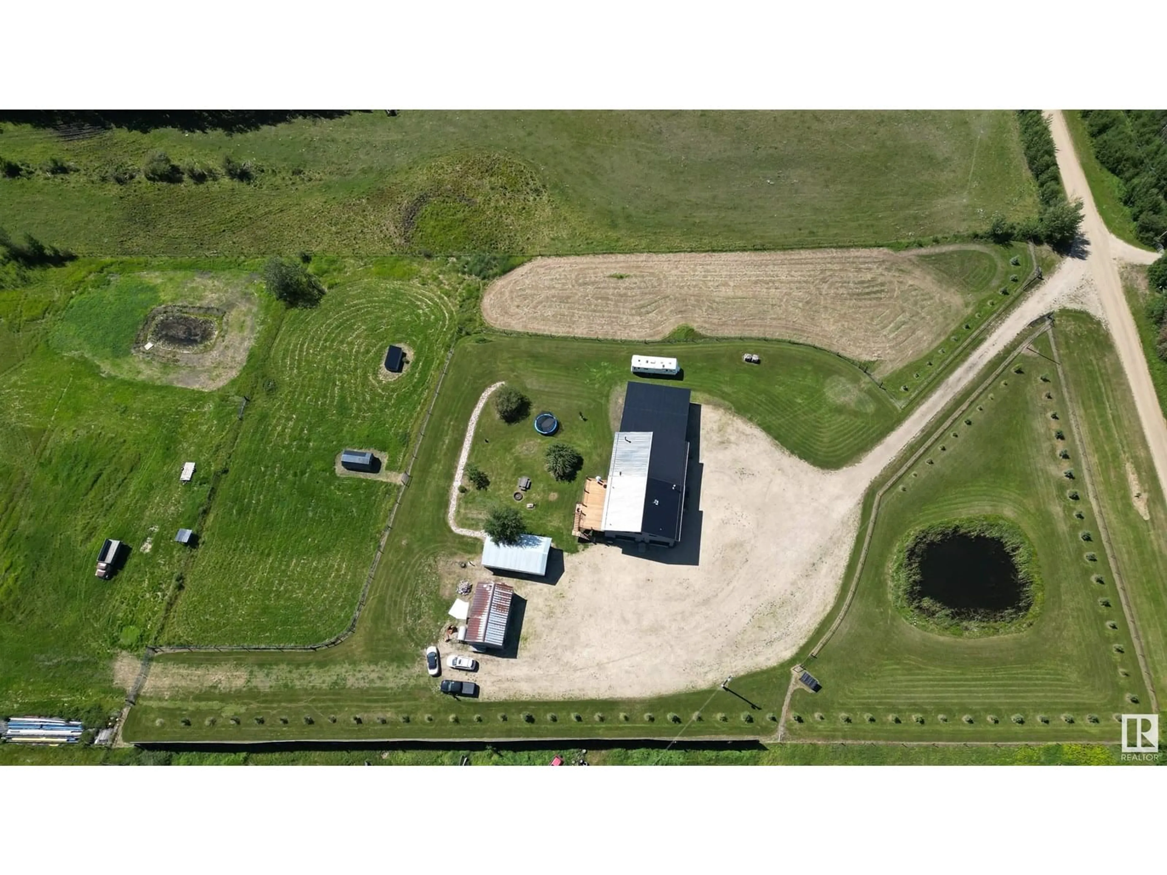 A pic from outside/outdoor area/front of a property/back of a property/a pic from drone, building for 6415 TWP ROAD 540, Rural Parkland County Alberta T0E0S0