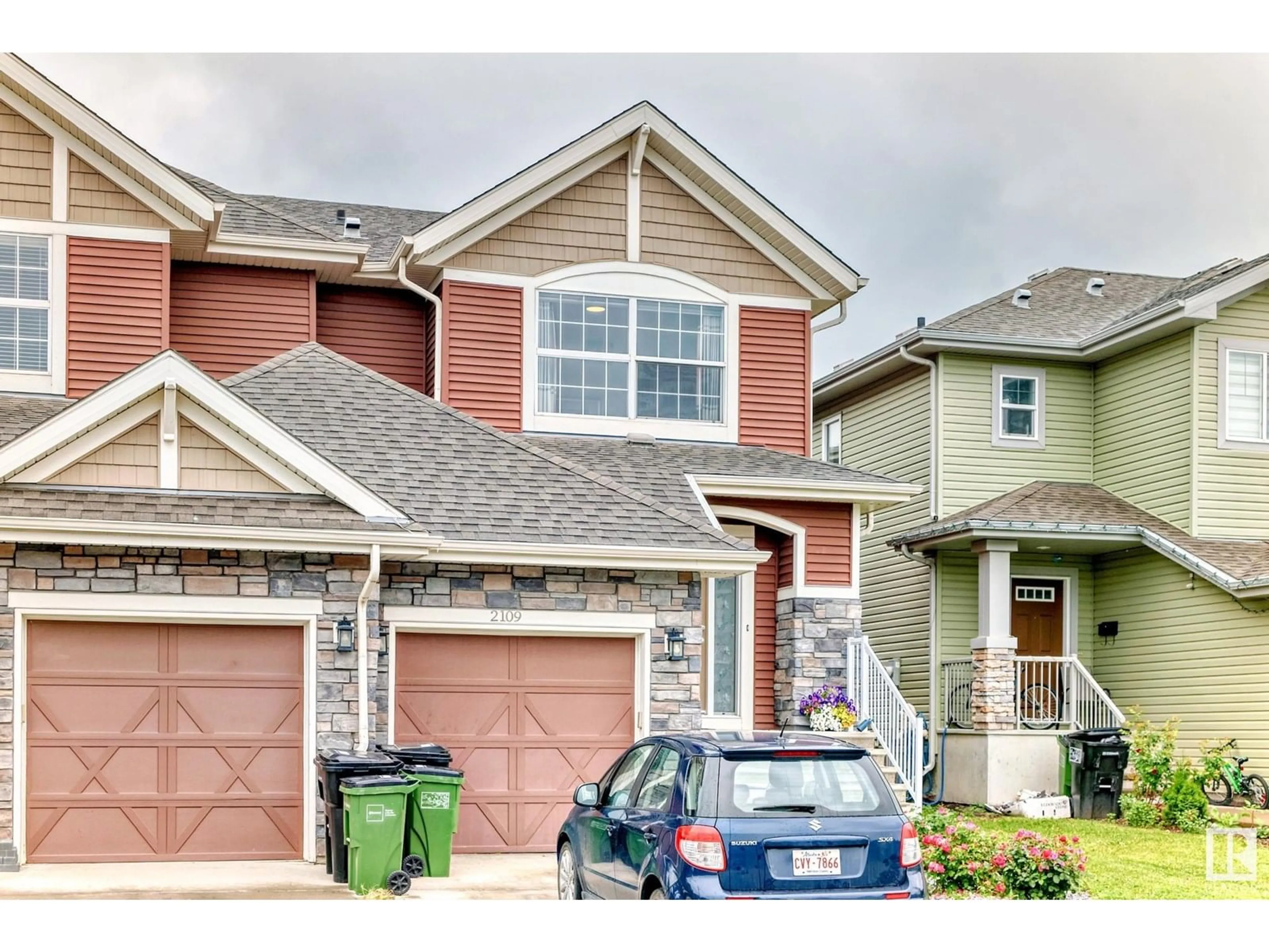 Home with brick exterior material, street for SW - 2109 52A ST, Edmonton Alberta T6X1X4