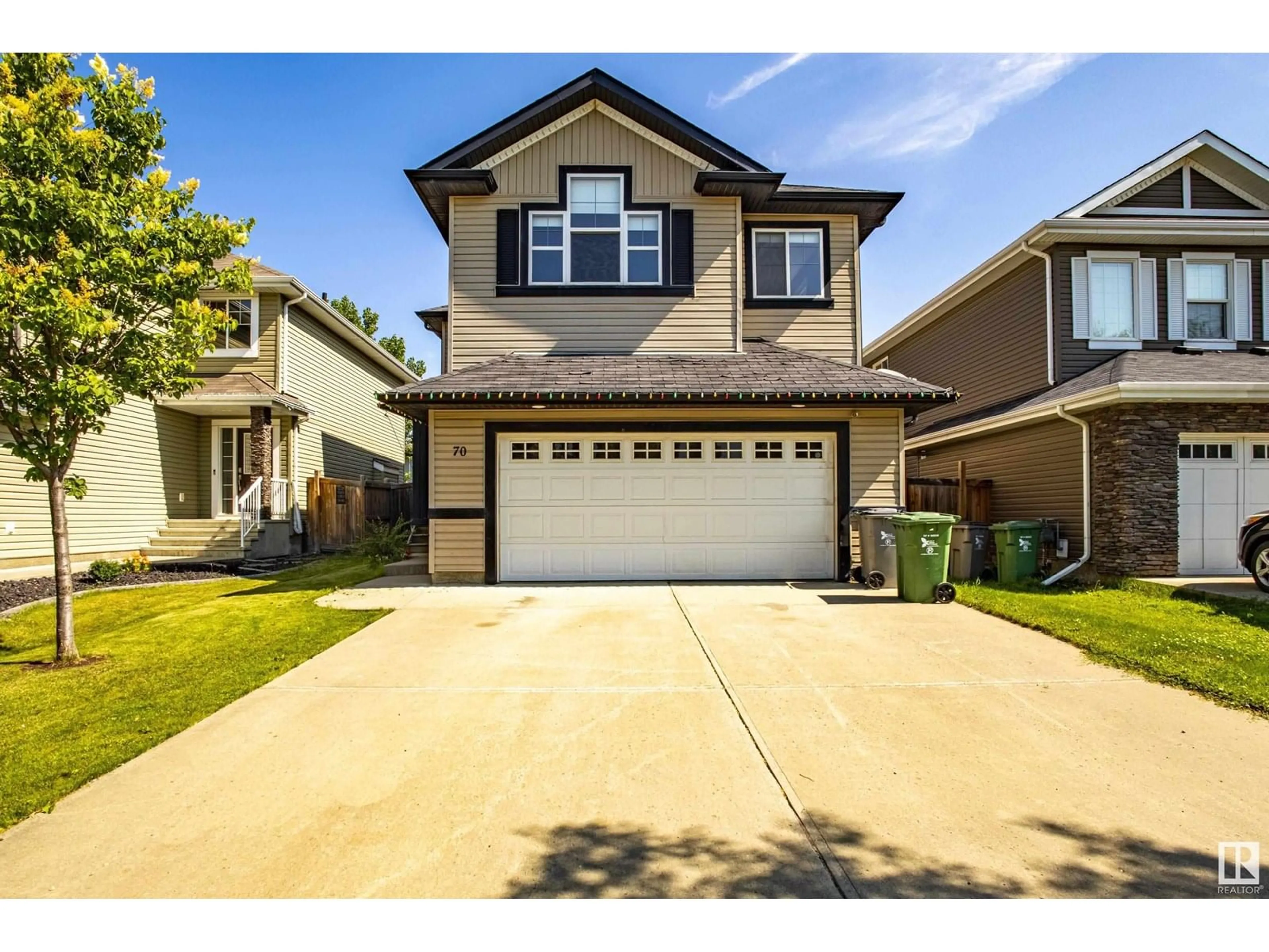 Home with vinyl exterior material, street for 70 RUE MONTALET, Beaumont Alberta T4X0C5