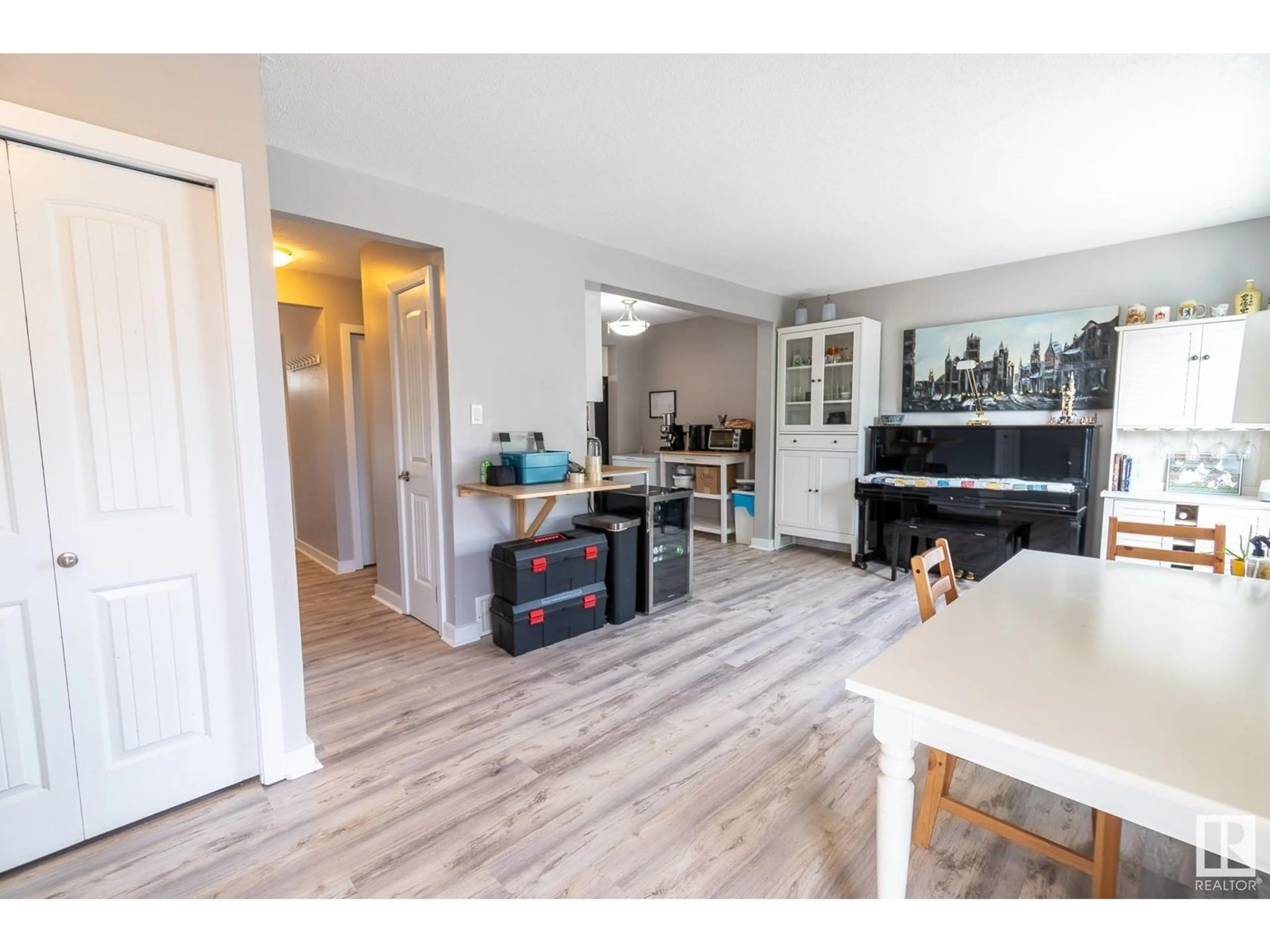 Open concept kitchen, wood/laminate floor for 211 DICKINSFIELD CO, Edmonton Alberta T5E5V8