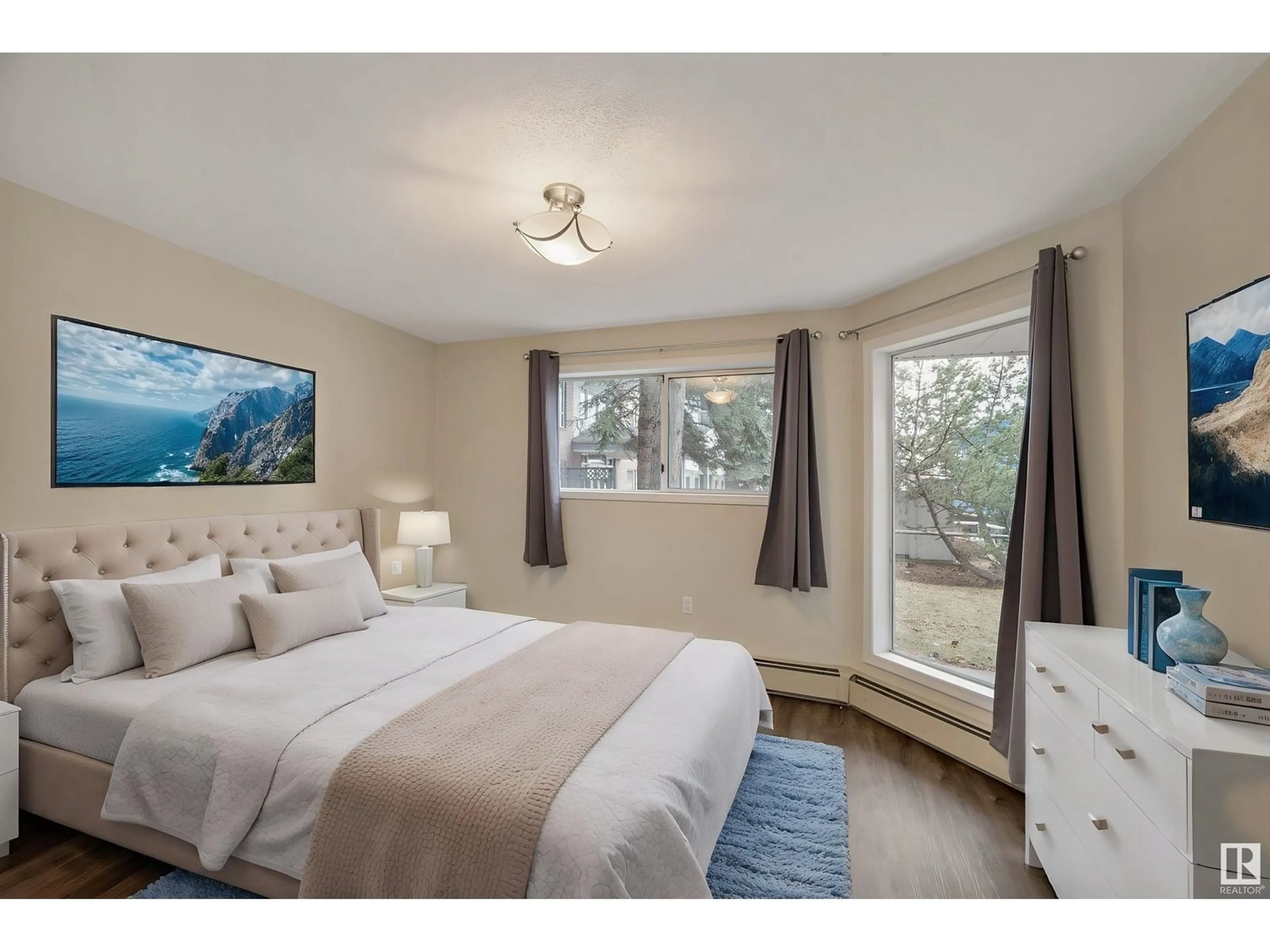 Bedroom with bed, wood/laminate floor for #110 - 15503 106 ST NW, Edmonton Alberta T5X5W7