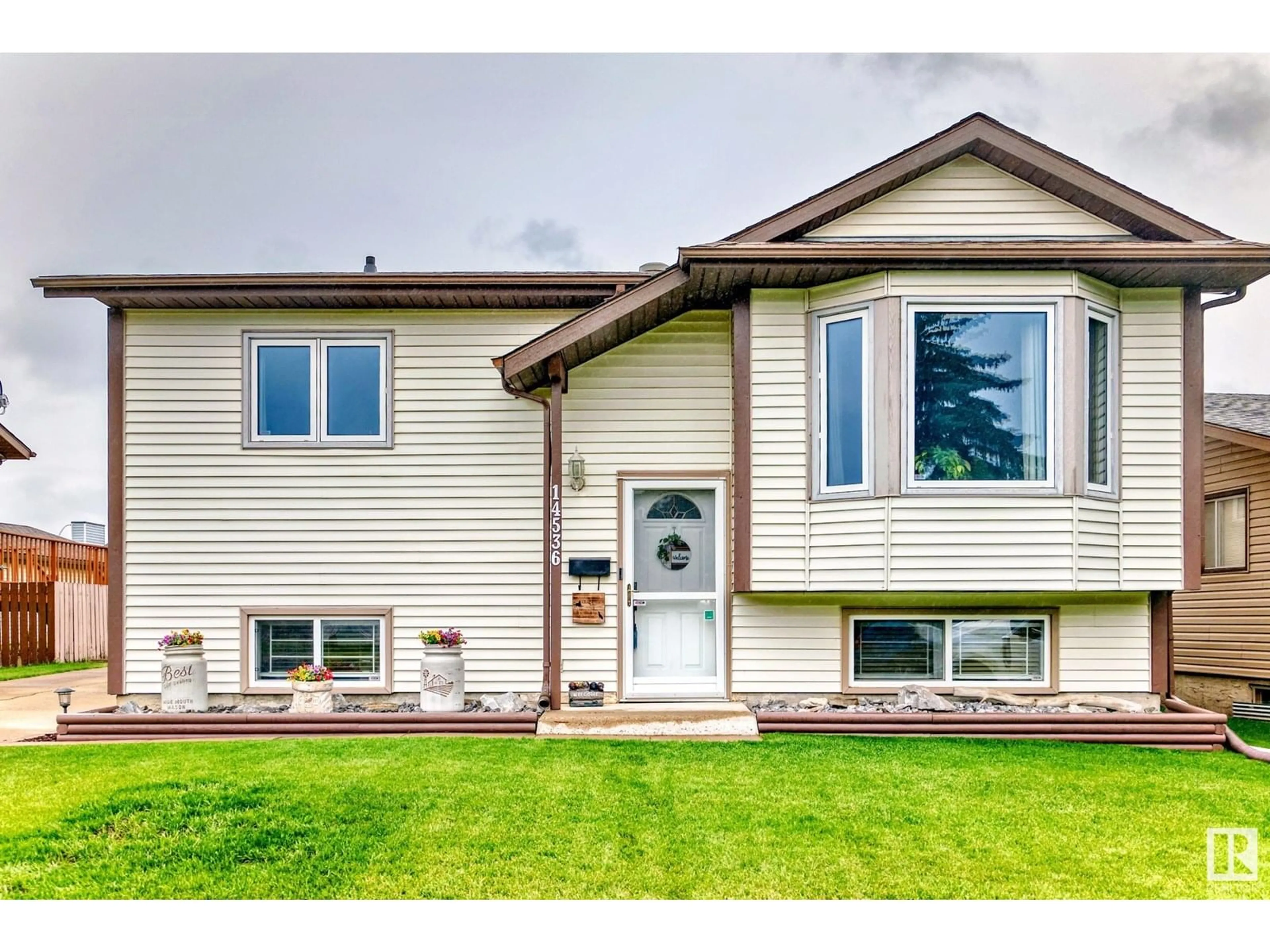 Home with vinyl exterior material, street for NW - 14536 31A ST, Edmonton Alberta T5Y2H7