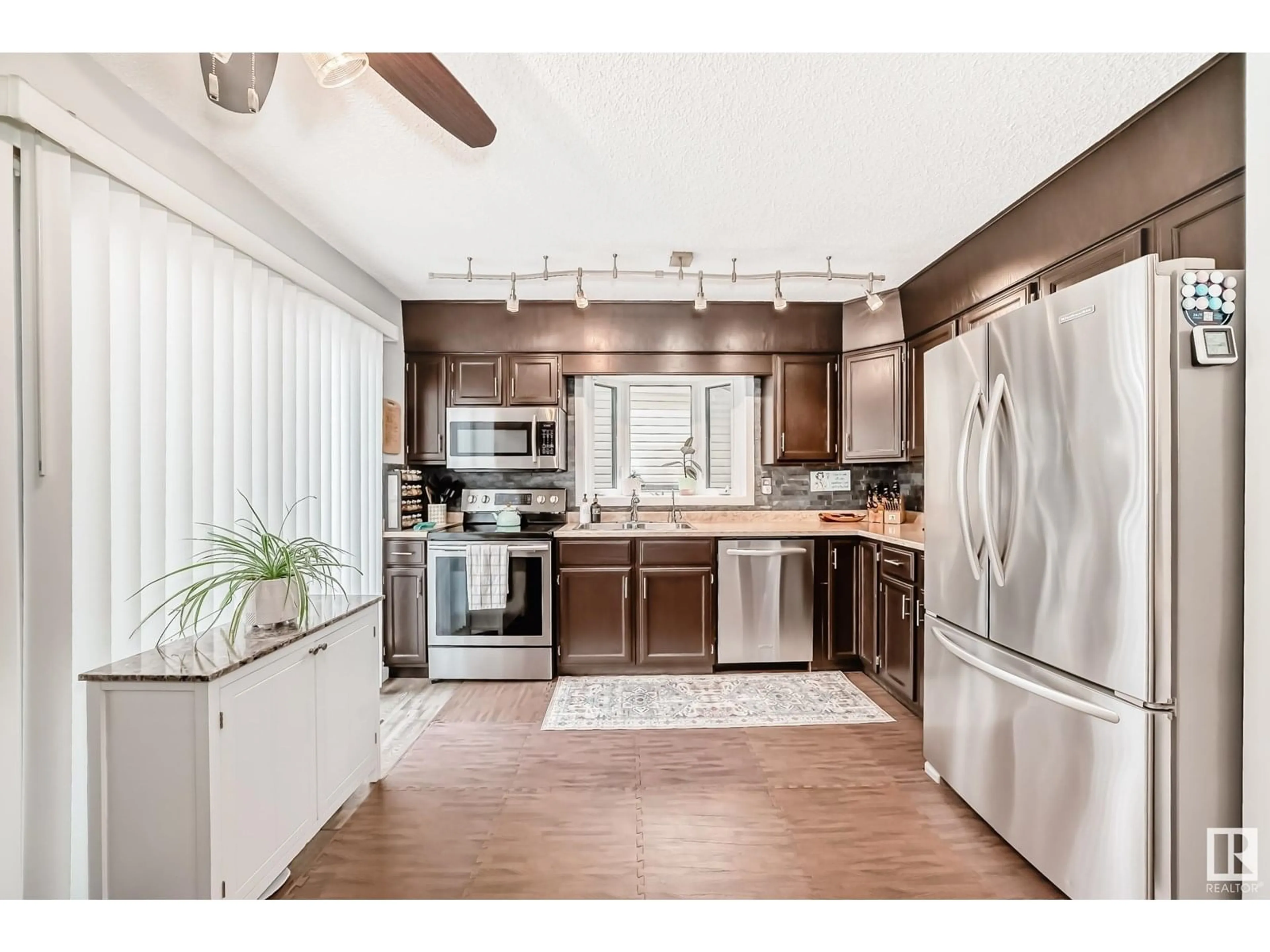 Open concept kitchen, unknown for NW - 14536 31A ST, Edmonton Alberta T5Y2H7