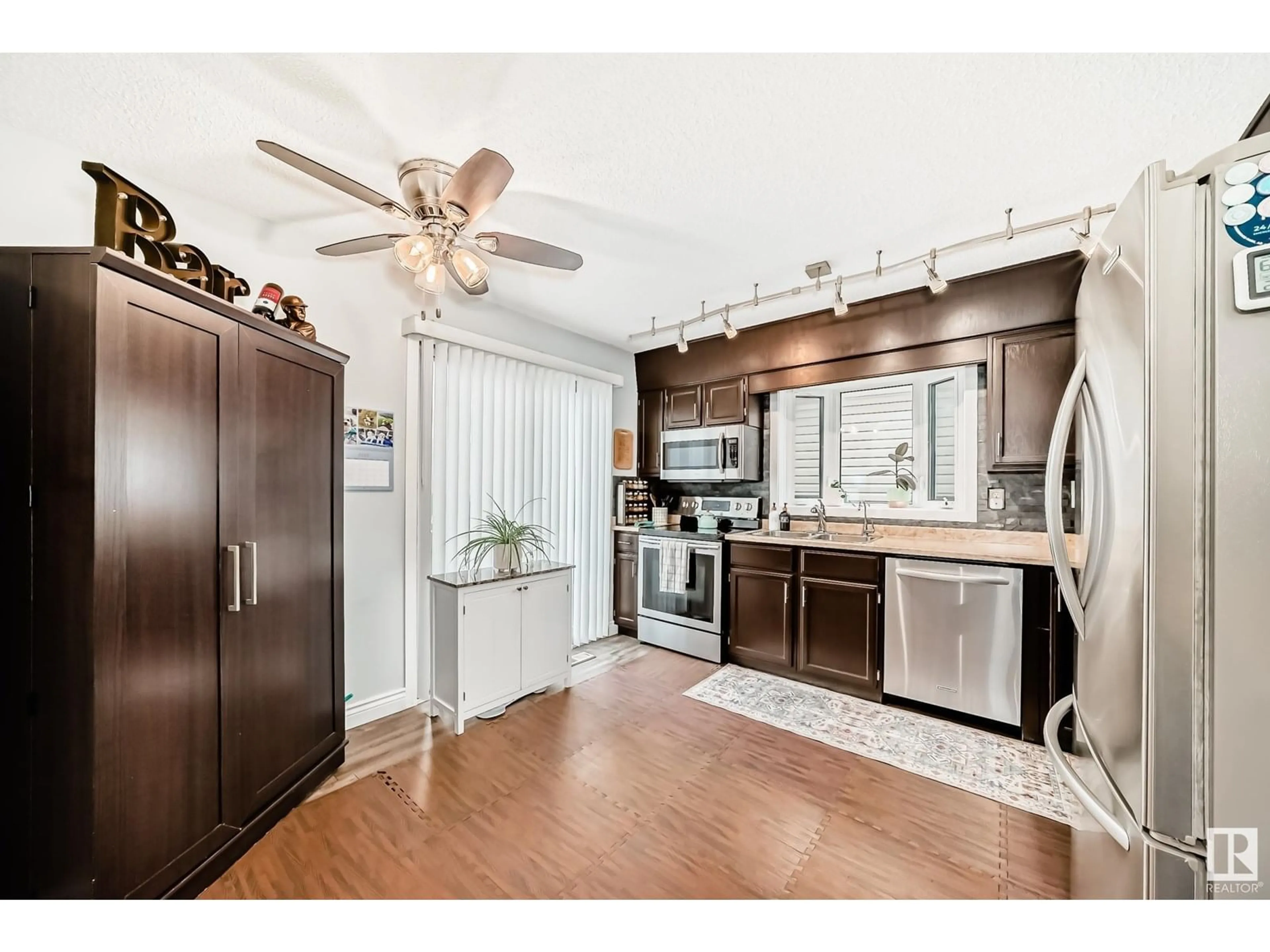 Open concept kitchen, unknown for NW - 14536 31A ST, Edmonton Alberta T5Y2H7