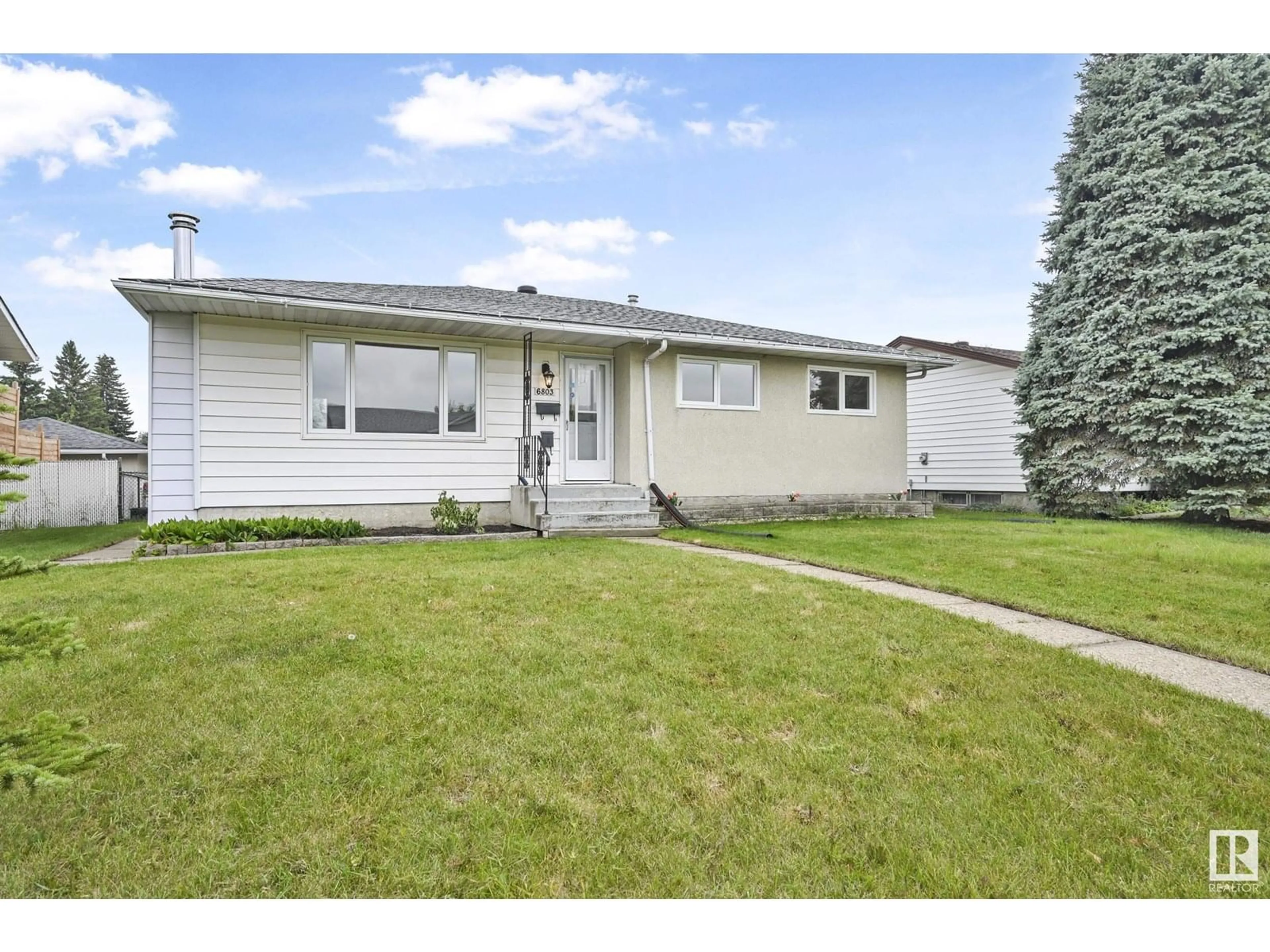 Home with vinyl exterior material, street for 6803 149A AV, Edmonton Alberta T5C2V8