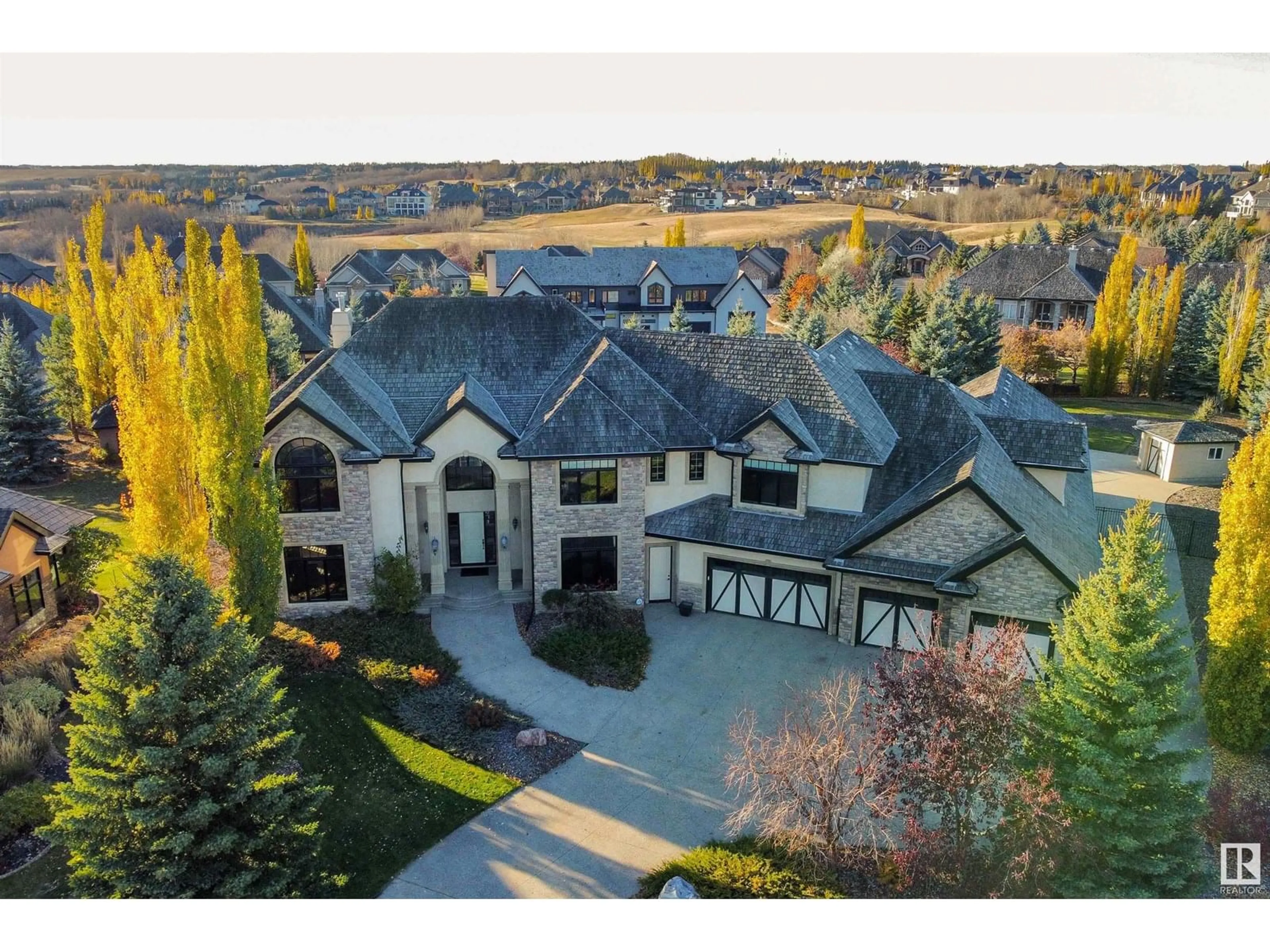 A pic from outside/outdoor area/front of a property/back of a property/a pic from drone, mountain view for 129 RIVERVIEW CR, Rural Sturgeon County Alberta T8T0B9