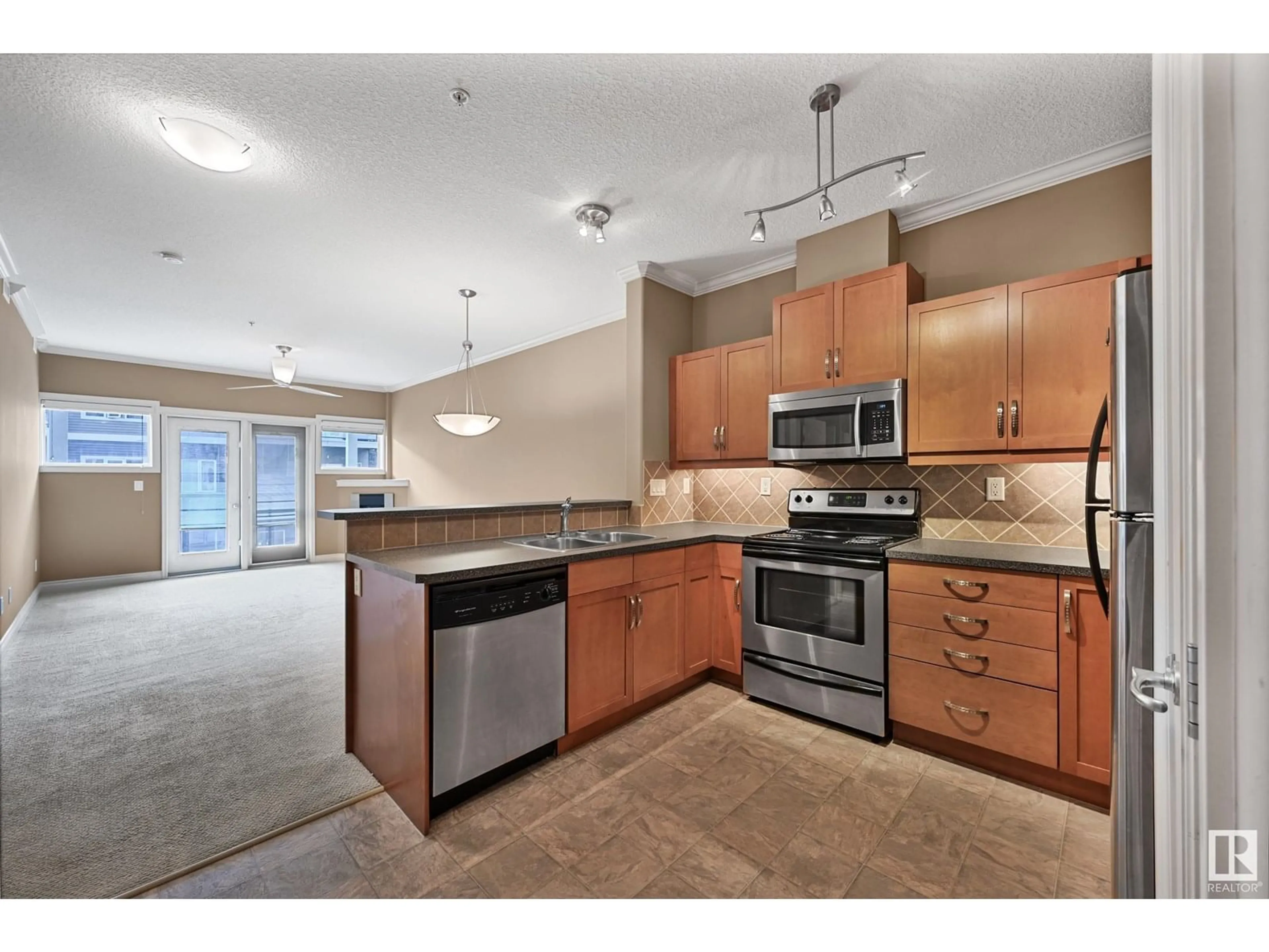 Open concept kitchen, unknown for 319 10121 80 AV NW, Edmonton Alberta T6E0B9