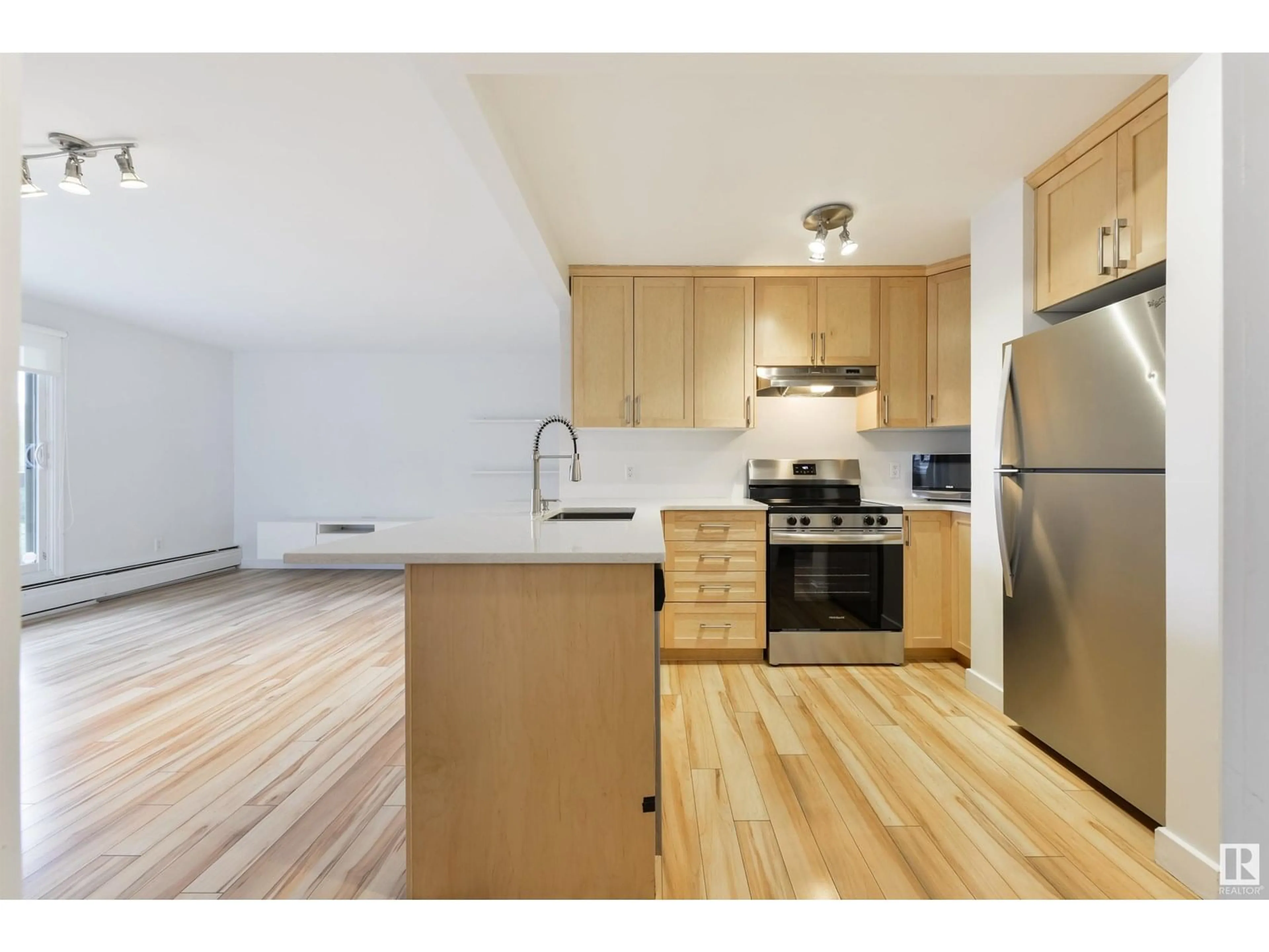 Standard kitchen, wood/laminate floor for 9715 - 607 110 ST, Edmonton Alberta T5K2M1