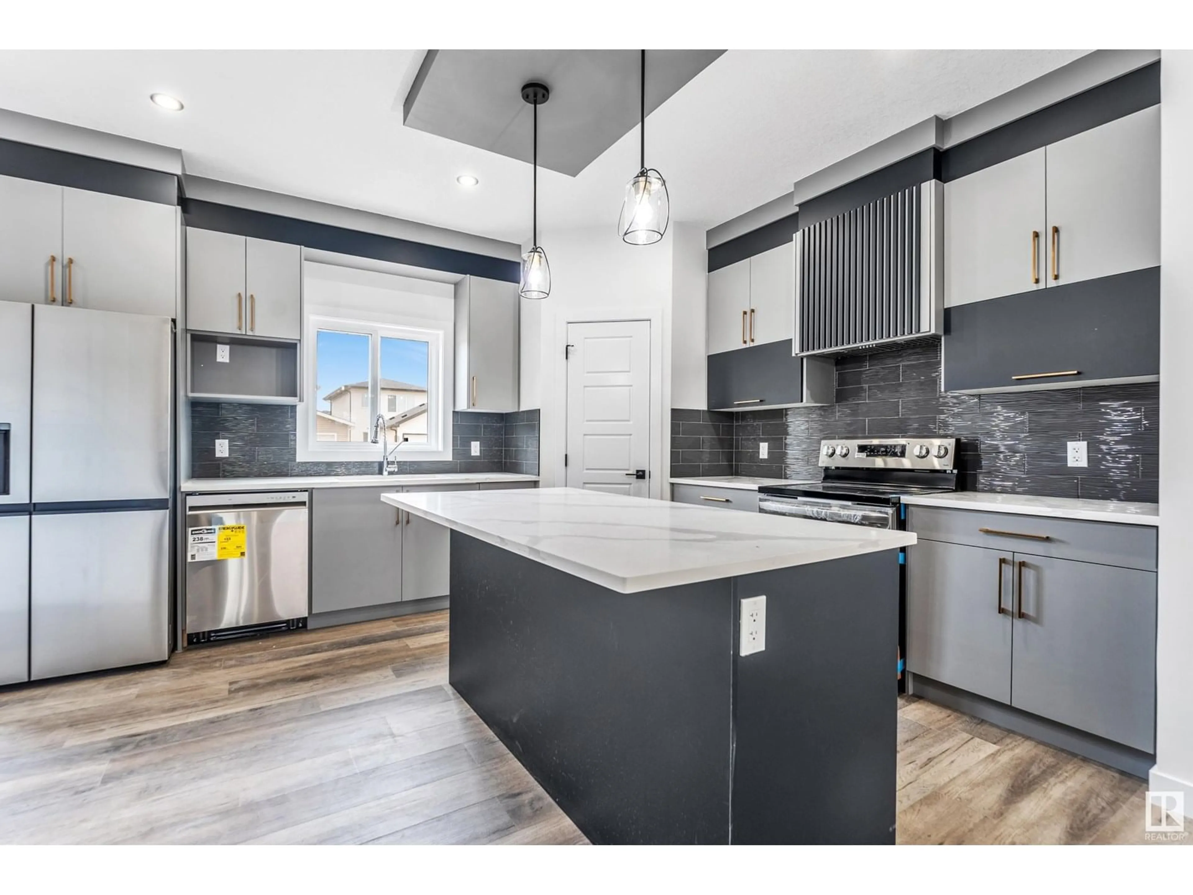 Open concept kitchen, unknown for 440 CRYSTAL CREEK LINK, Leduc Alberta T9E1N3