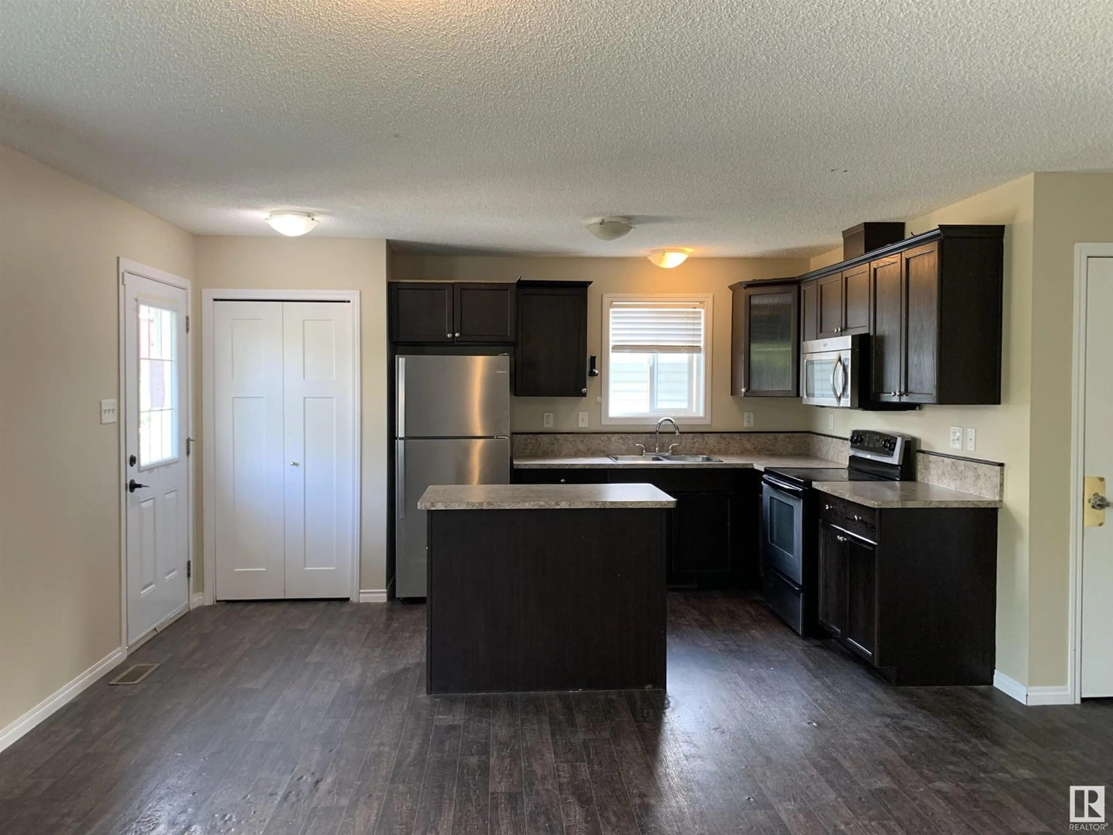 Open concept kitchen, unknown for NW - 11824 93 ST, Edmonton Alberta T5G1E3