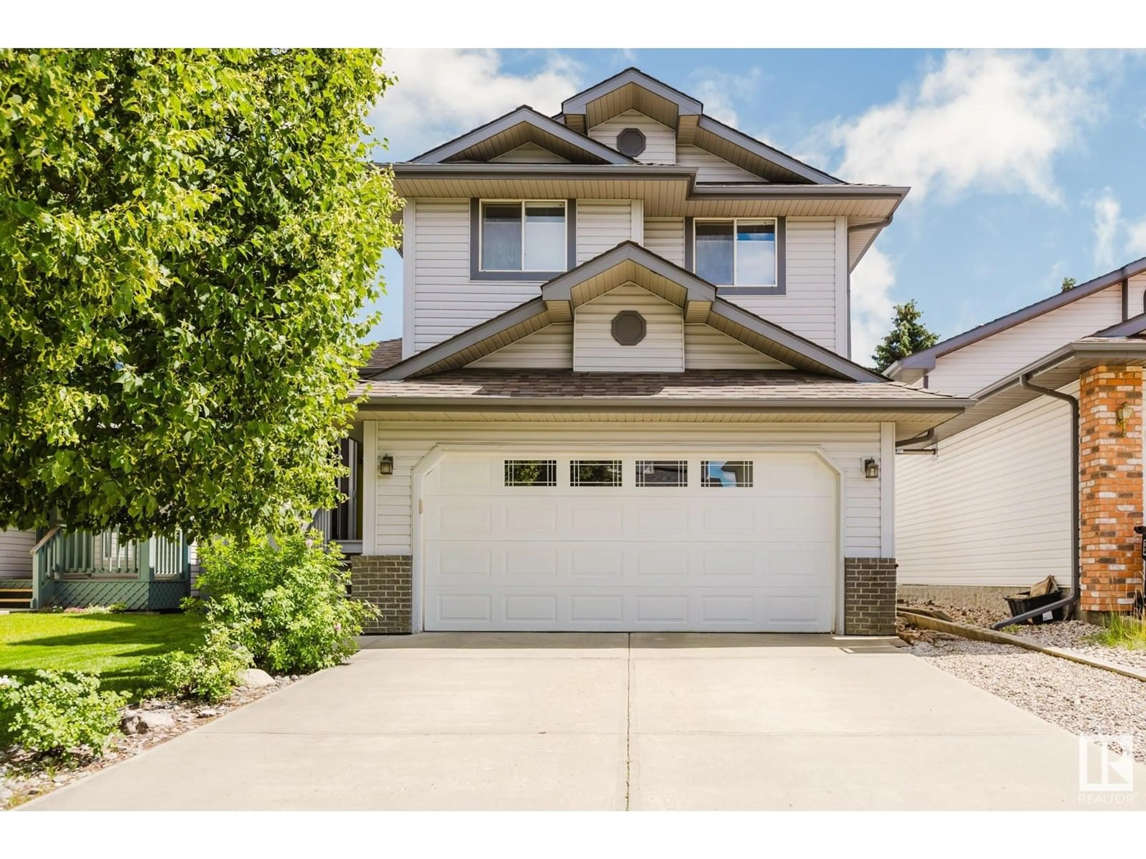 Home with vinyl exterior material, street for NW - 829 116A ST, Edmonton Alberta T6J6Z8