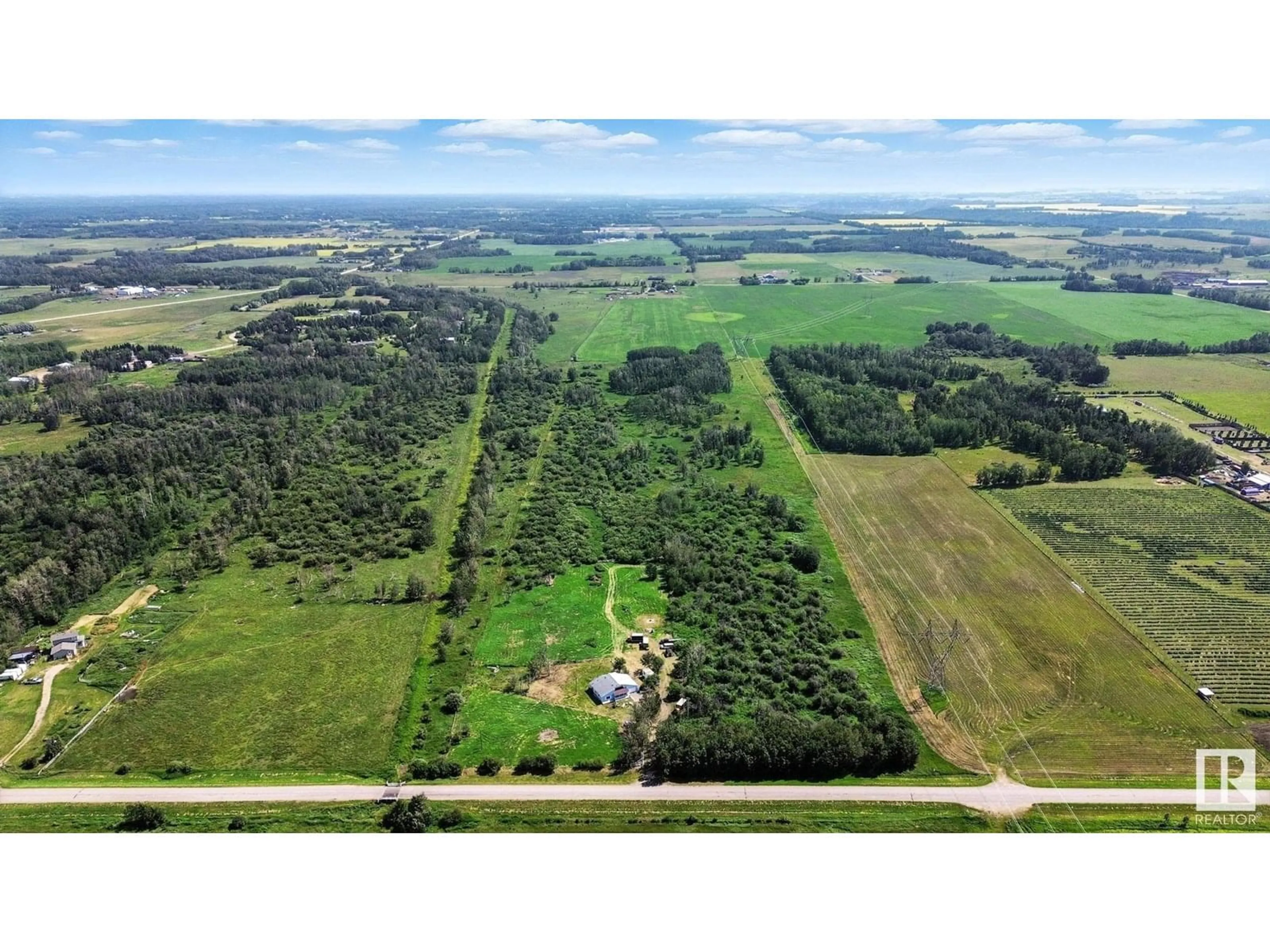 A pic from outside/outdoor area/front of a property/back of a property/a pic from drone, forest/trees view for 51019 RGE ROAD 273, Rural Parkland County Alberta T7Z1Z7