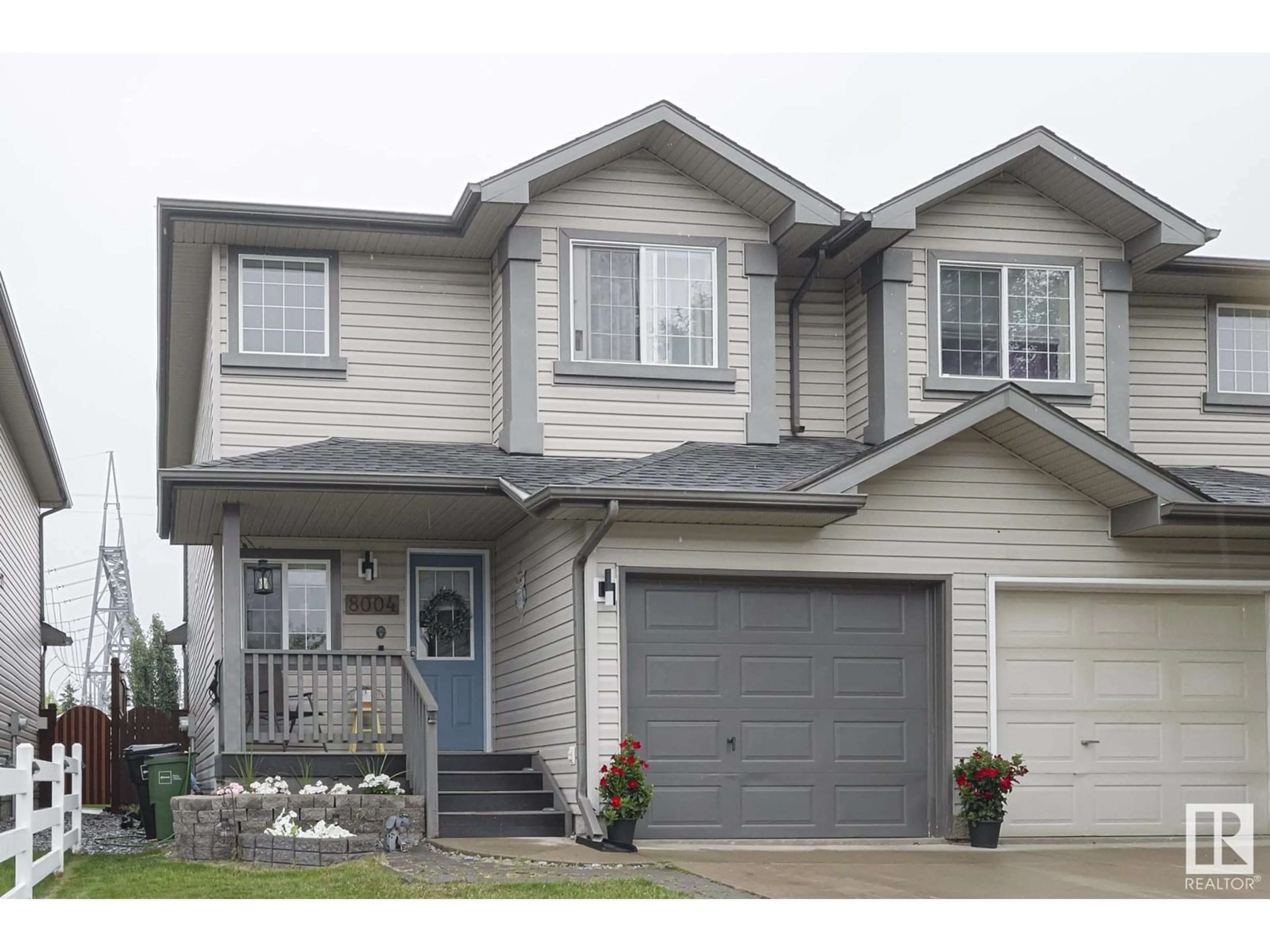 Home with vinyl exterior material, street for SW - 8004 2 AV, Edmonton Alberta T6X1K2