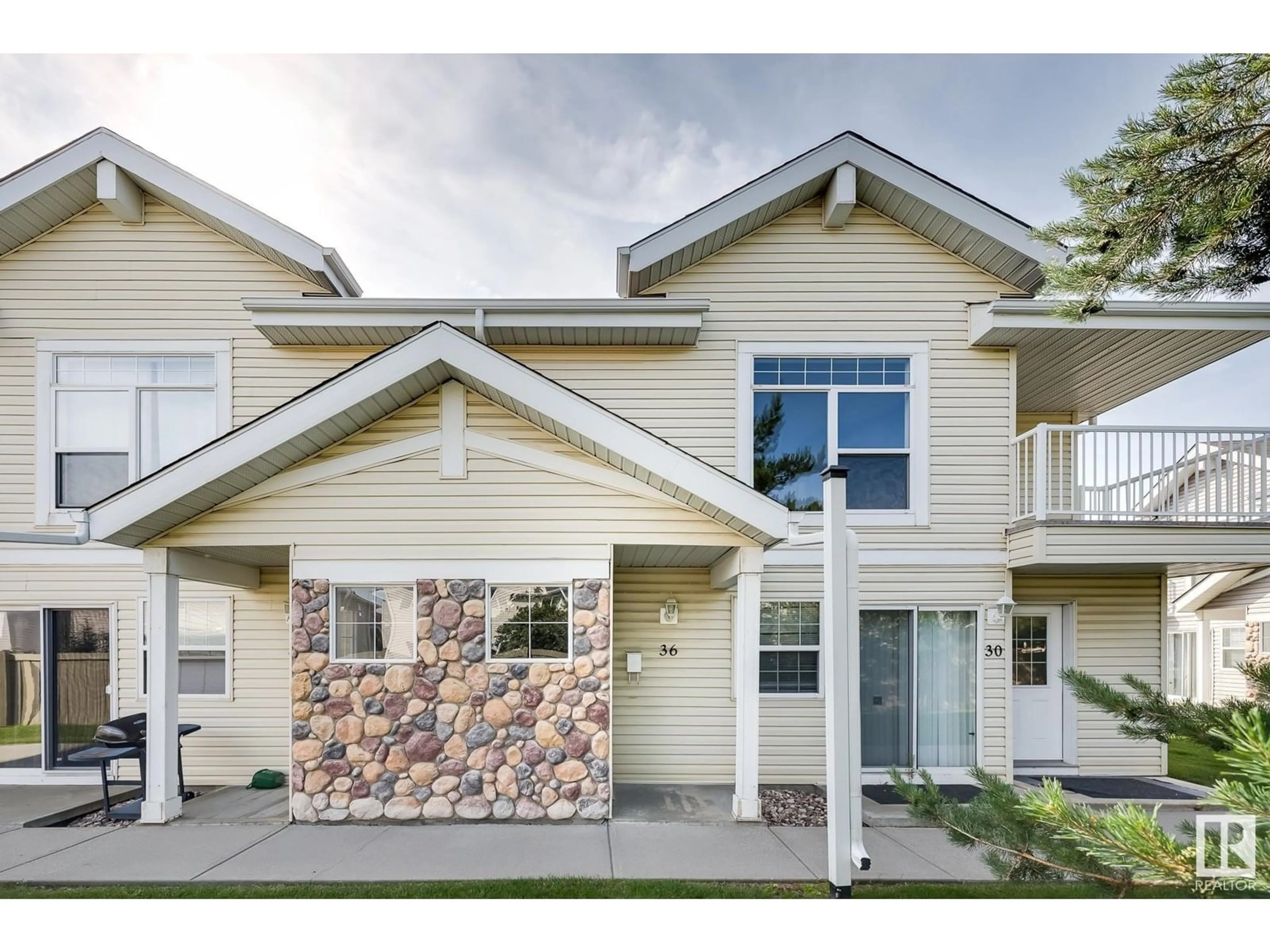 Home with vinyl exterior material, street for #36 - 150 EDWARDS DR, Edmonton Alberta T6X1M4
