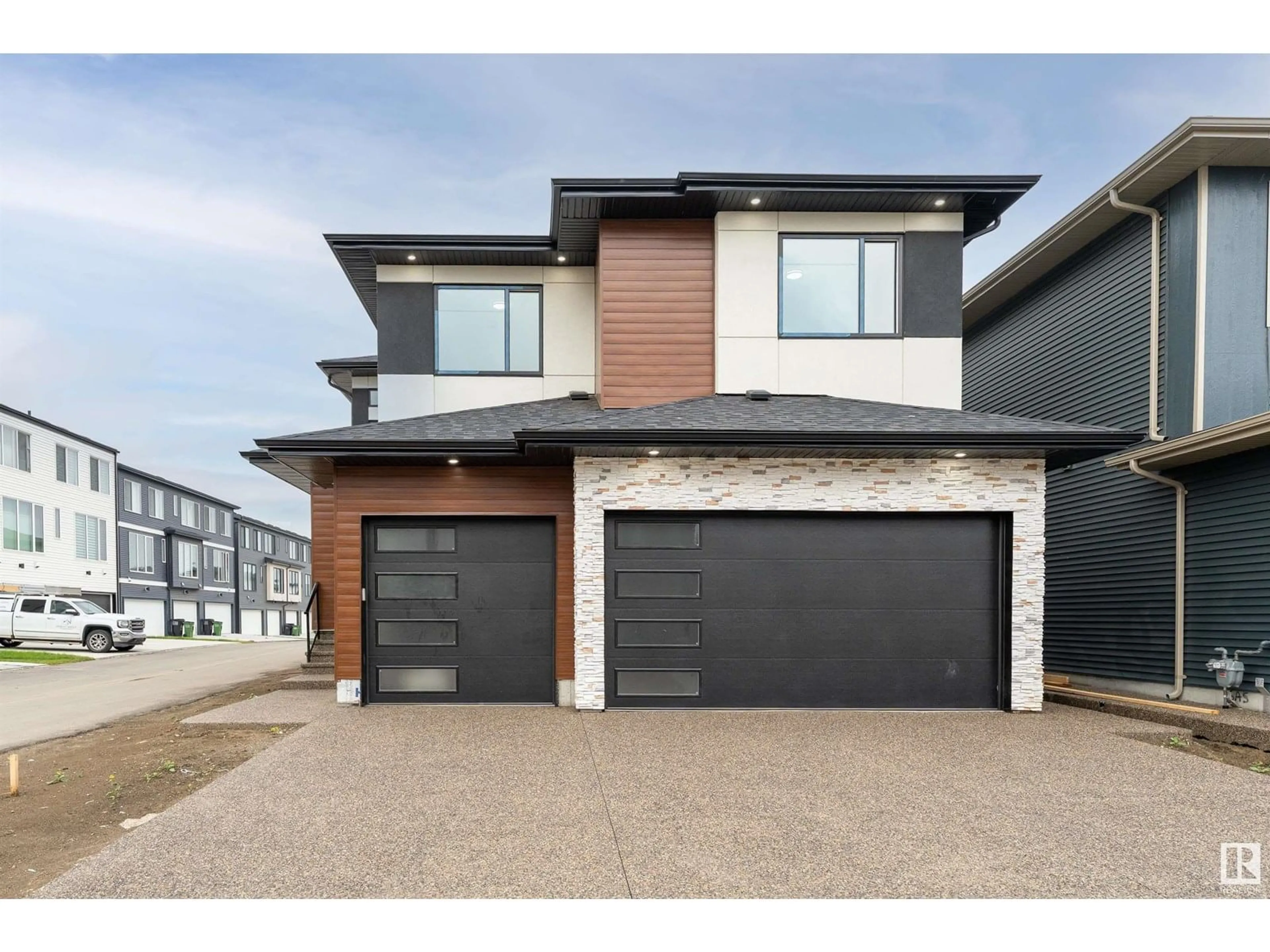 Home with brick exterior material, street for 7010 KIVIAQ CR, Edmonton Alberta T6W1A5