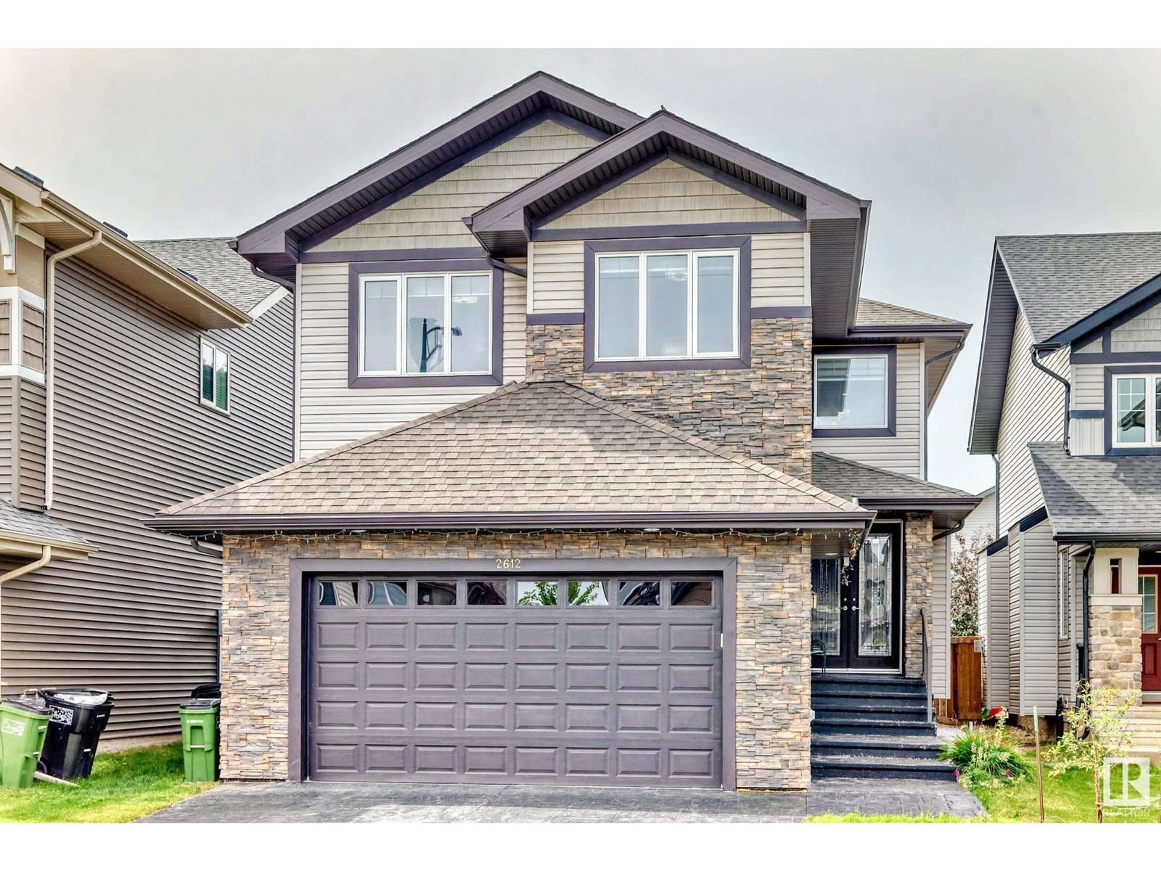 Home with vinyl exterior material, street for 2612 ADAM CO, Edmonton Alberta T6W3C1