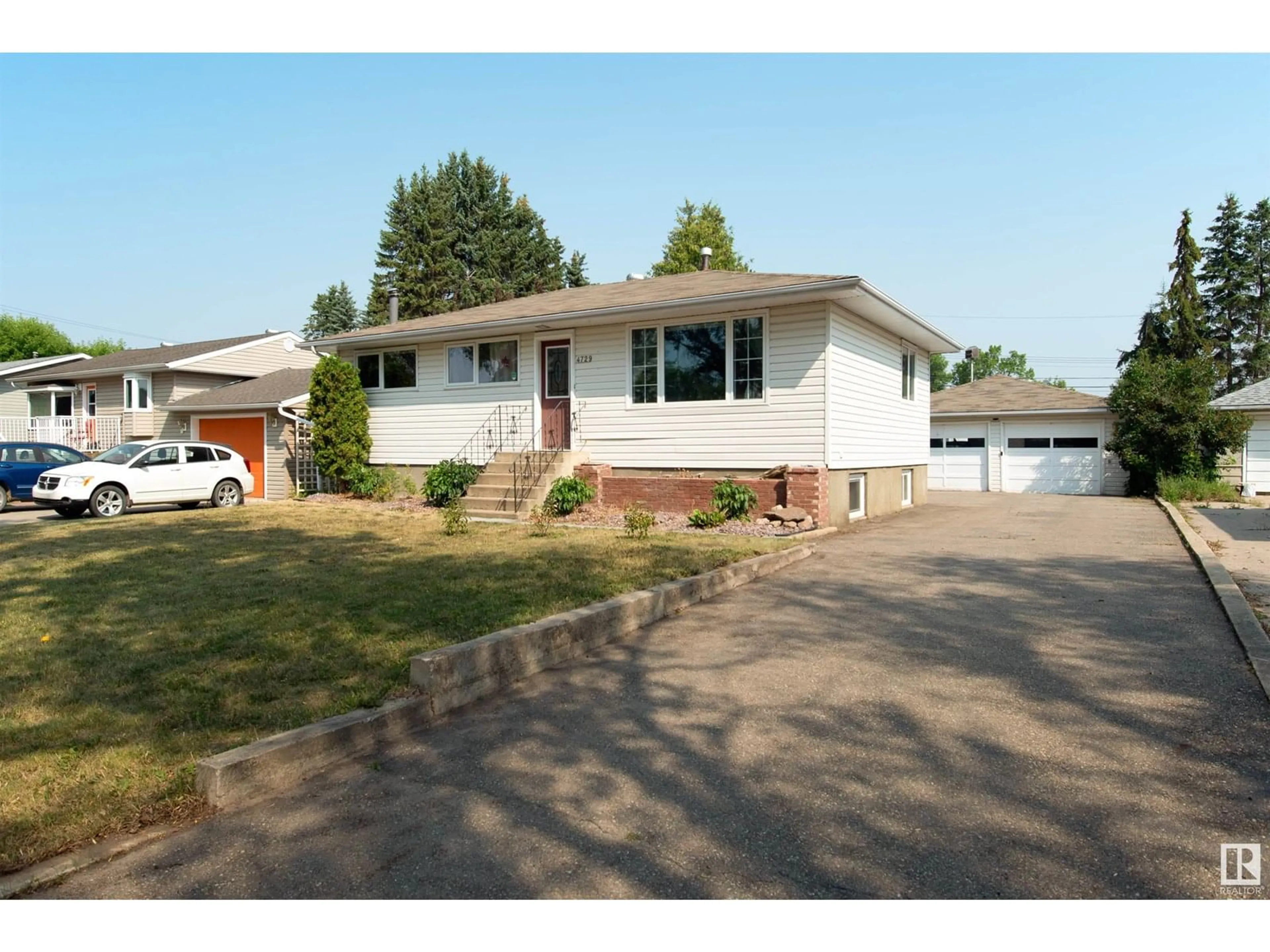 Home with vinyl exterior material, street for 4729 45 AV, Bonnyville Town Alberta T9N1M7