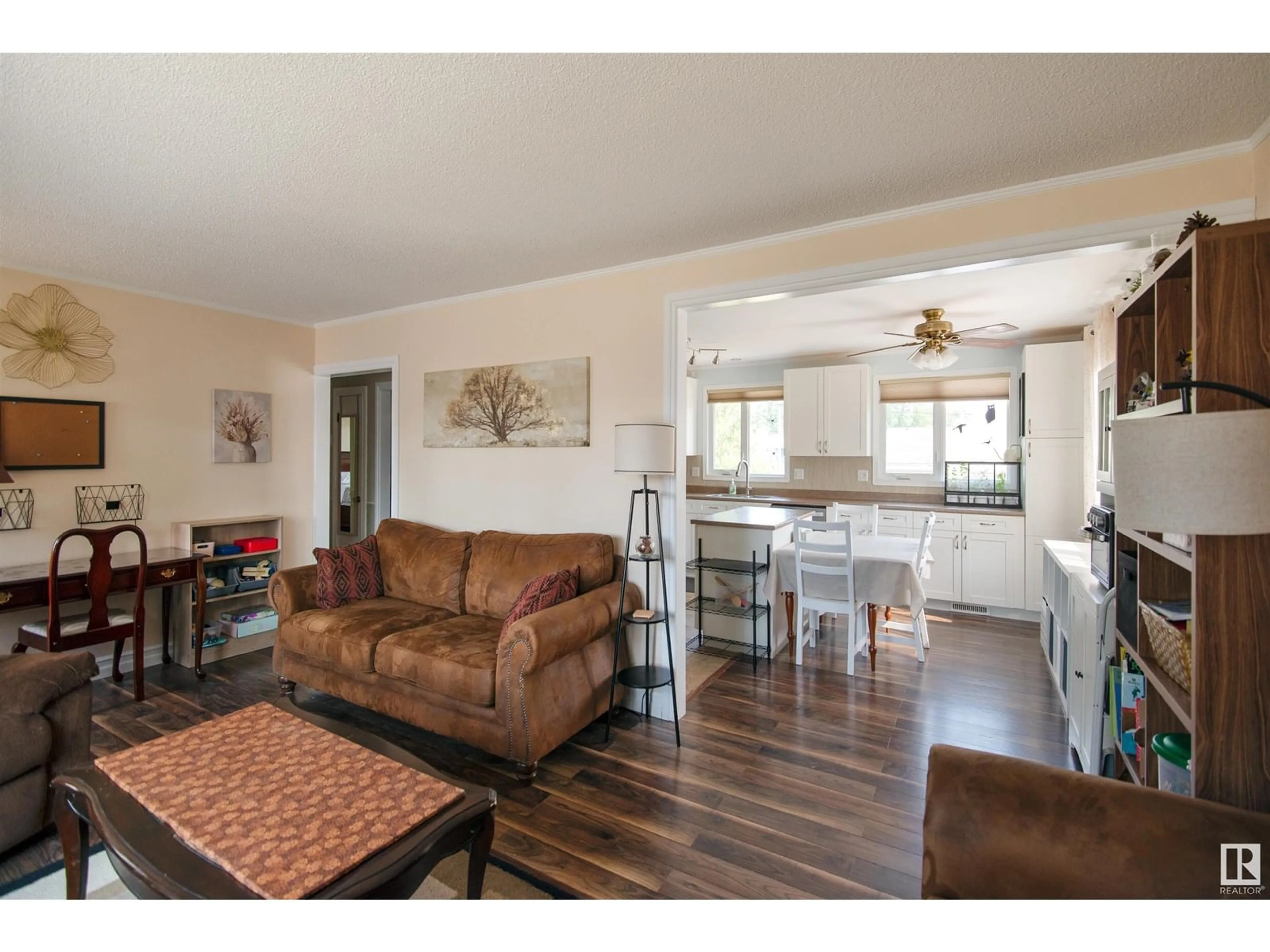 Living room with furniture, wood/laminate floor for 4729 45 AV, Bonnyville Town Alberta T9N1M7