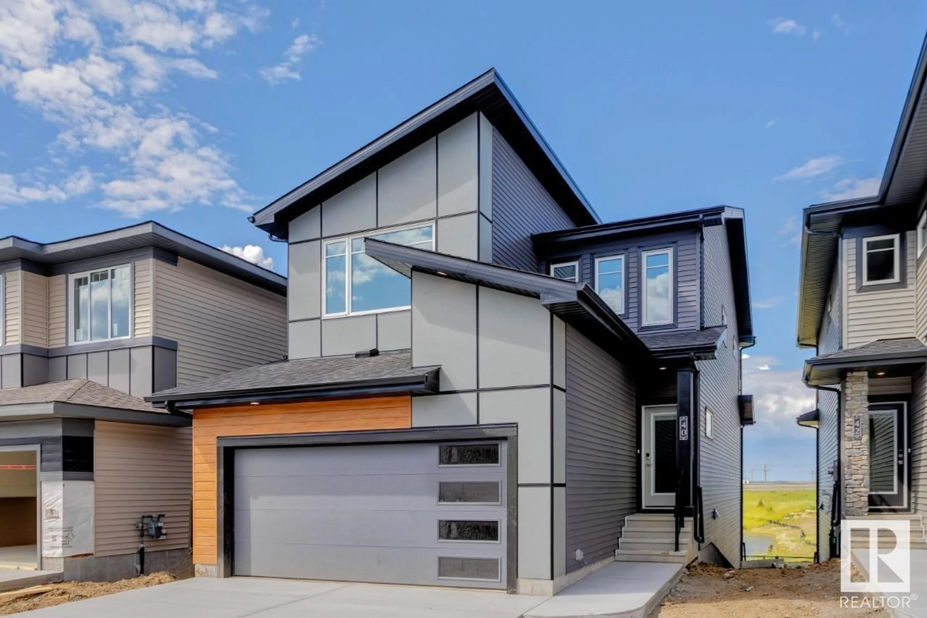 Home with vinyl exterior material, street for 40 GAMBEL LO, Spruce Grove Alberta T7X0C9