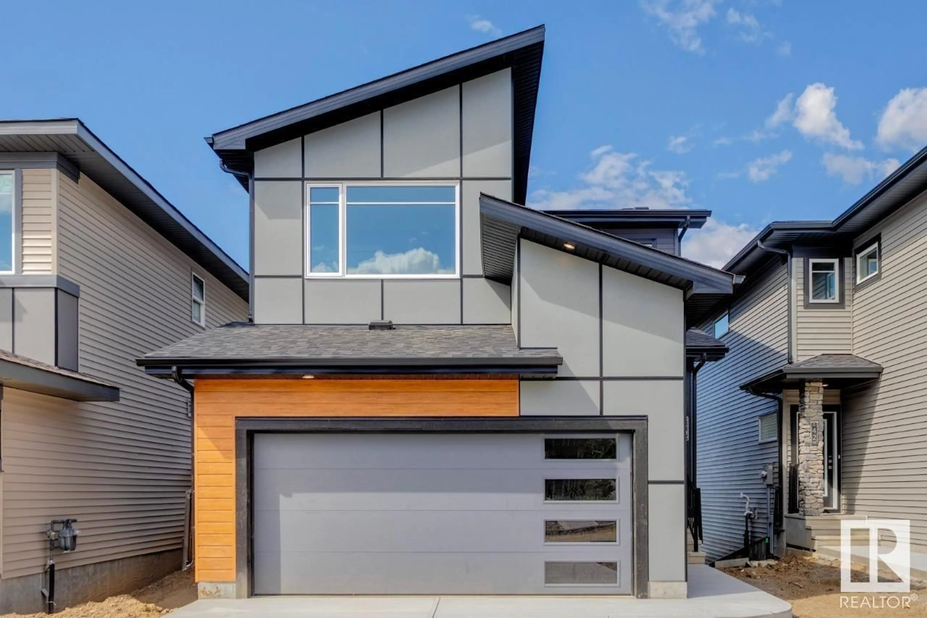 Home with vinyl exterior material, street for 40 GAMBEL LO, Spruce Grove Alberta T7X0C9