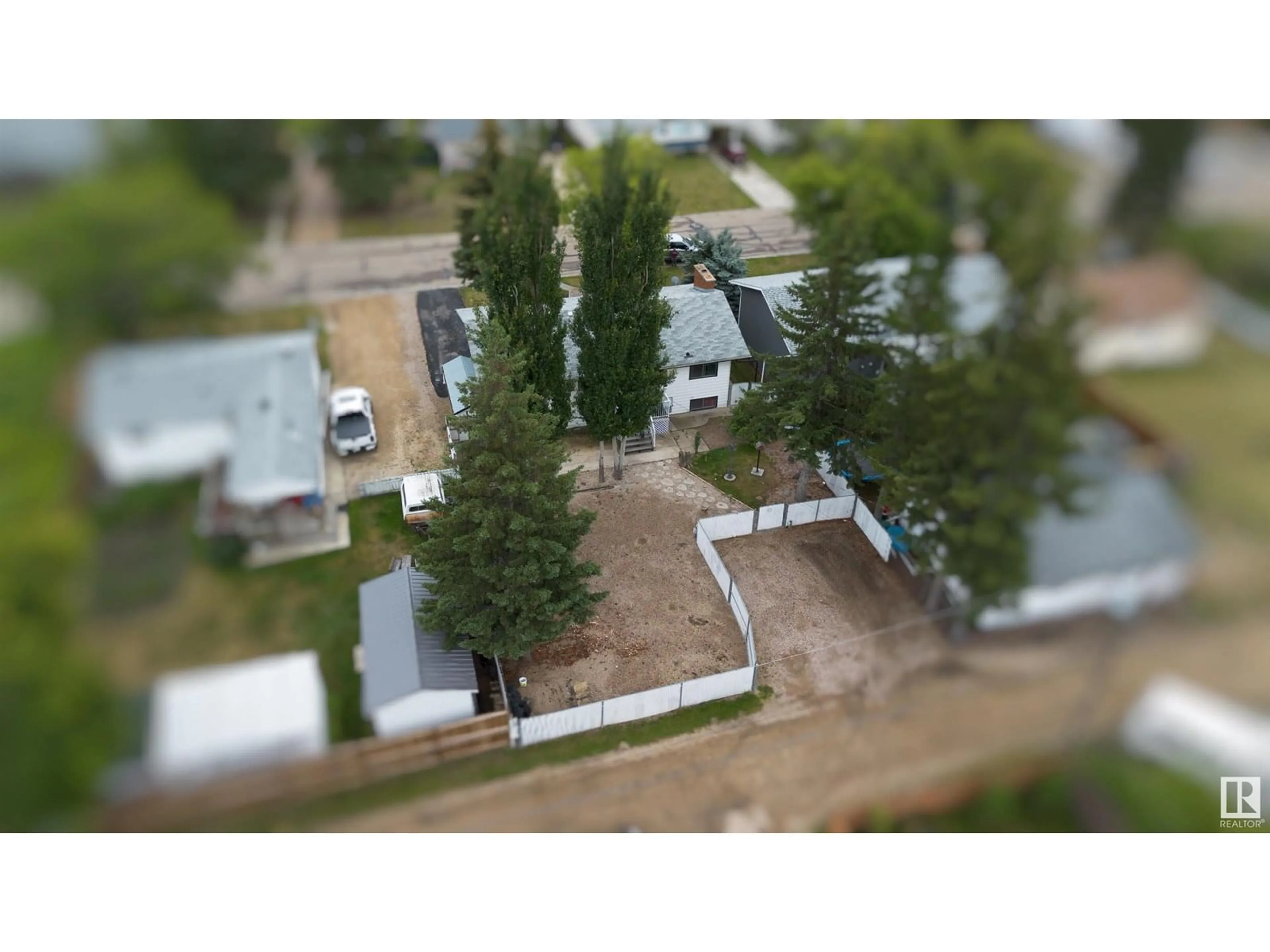 A pic from outside/outdoor area/front of a property/back of a property/a pic from drone, street for 4818 50 ST, Barrhead Alberta T7N1G4
