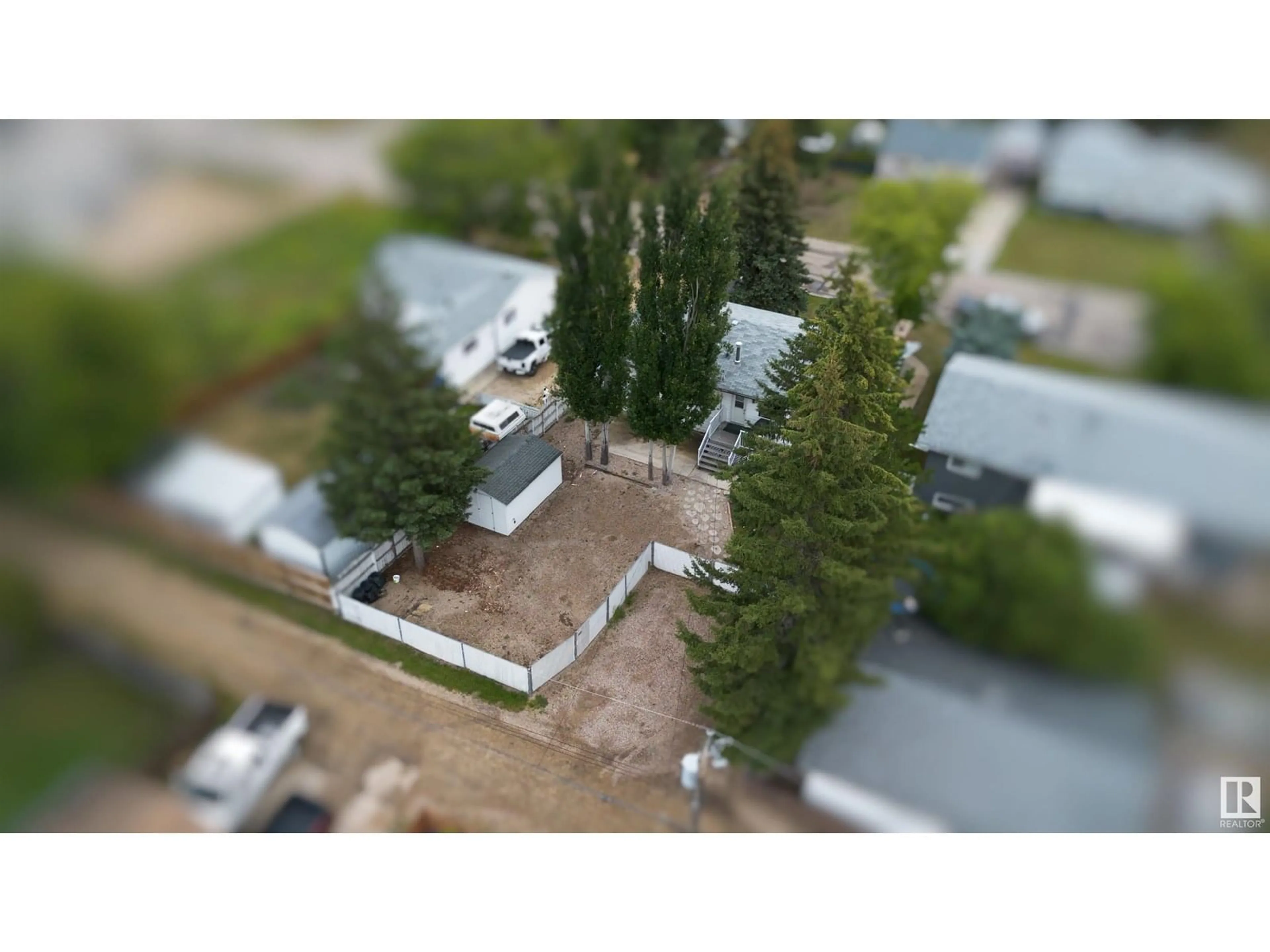 A pic from outside/outdoor area/front of a property/back of a property/a pic from drone, unknown for 4818 50 ST, Barrhead Alberta T7N1G4