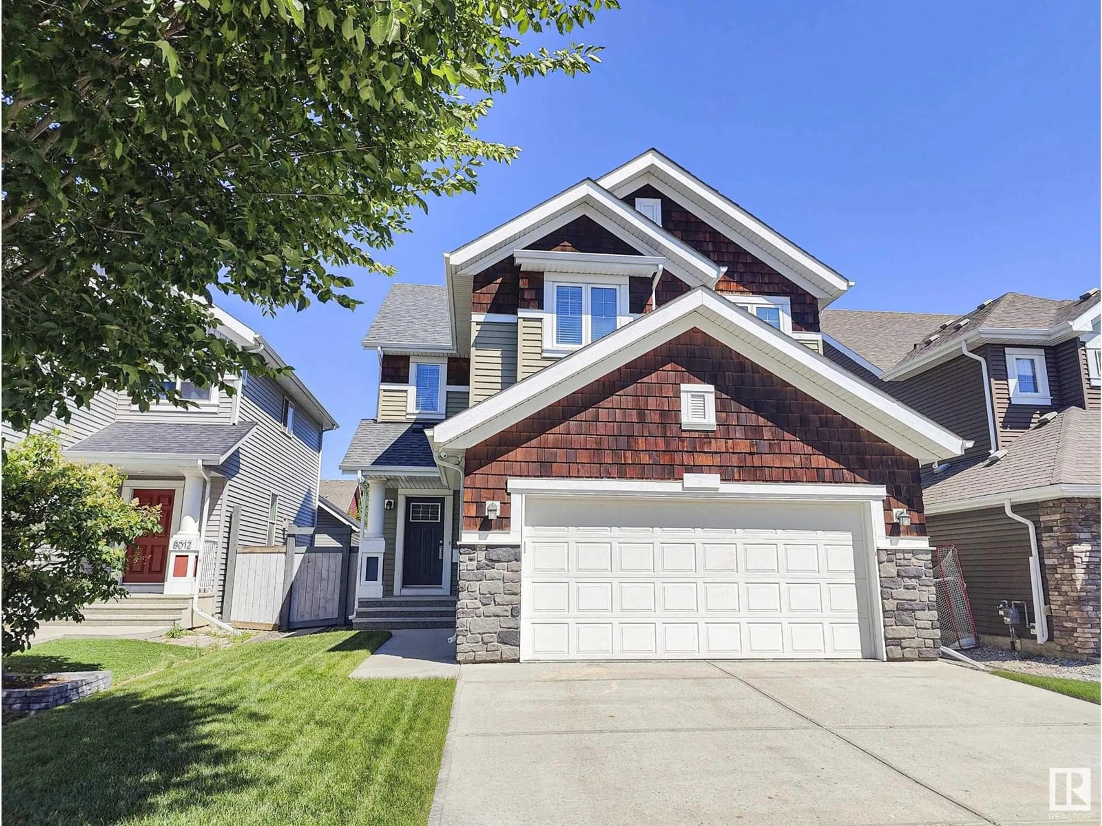 Home with brick exterior material, street for 8008 18 AV, Edmonton Alberta T6X0Z8