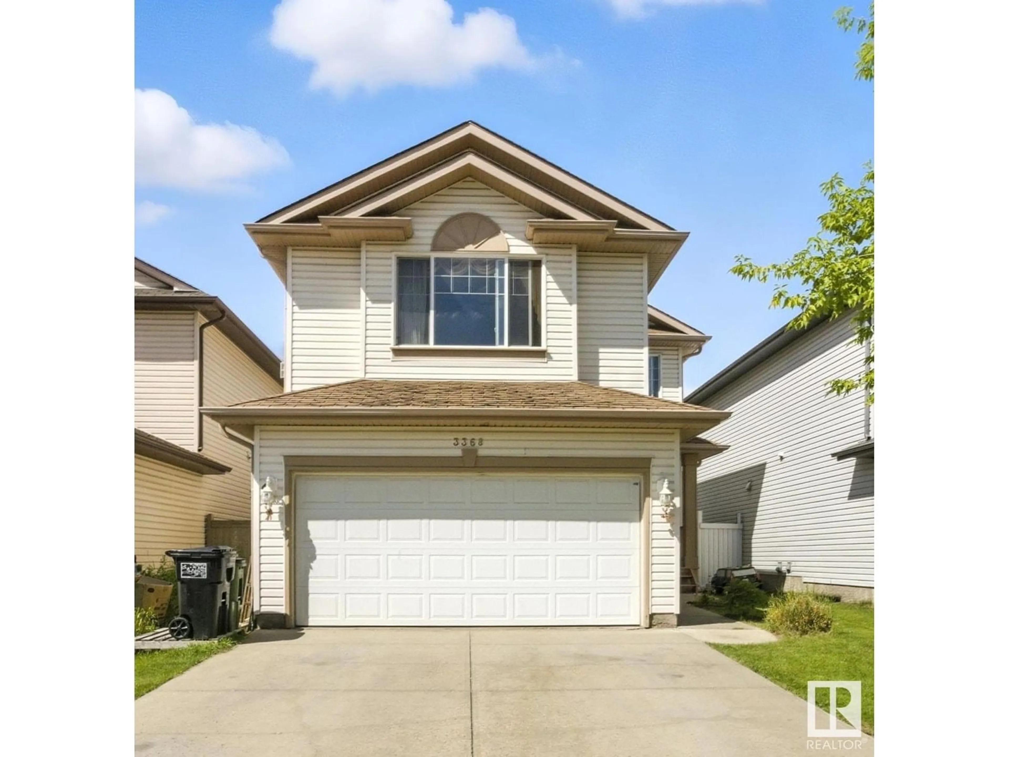 Home with vinyl exterior material, street for 3368 24 AV, Edmonton Alberta T6T1Y5