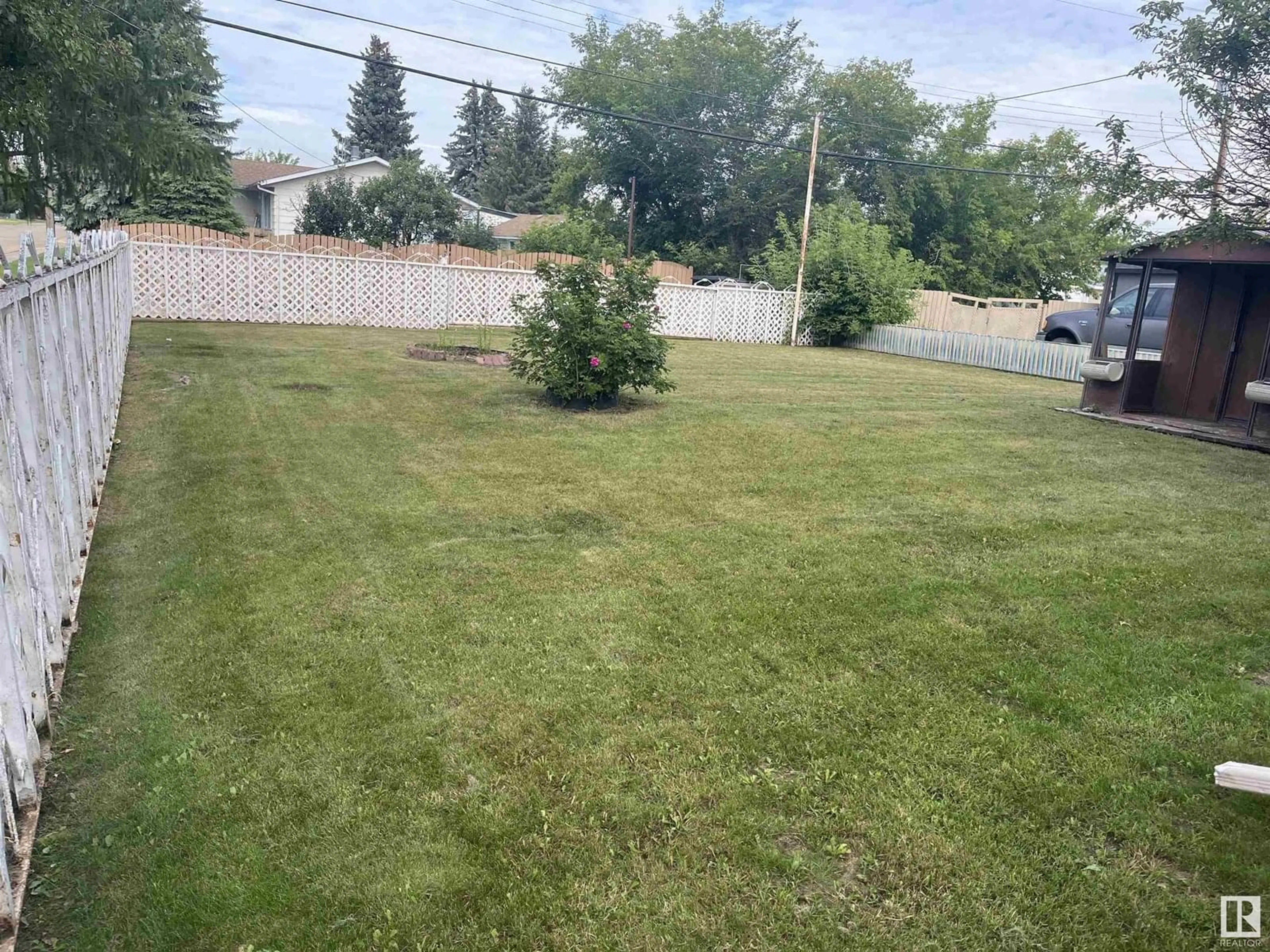 A pic from outside/outdoor area/front of a property/back of a property/a pic from drone, street for 5446 45 ST, Vegreville Alberta T9C1C9