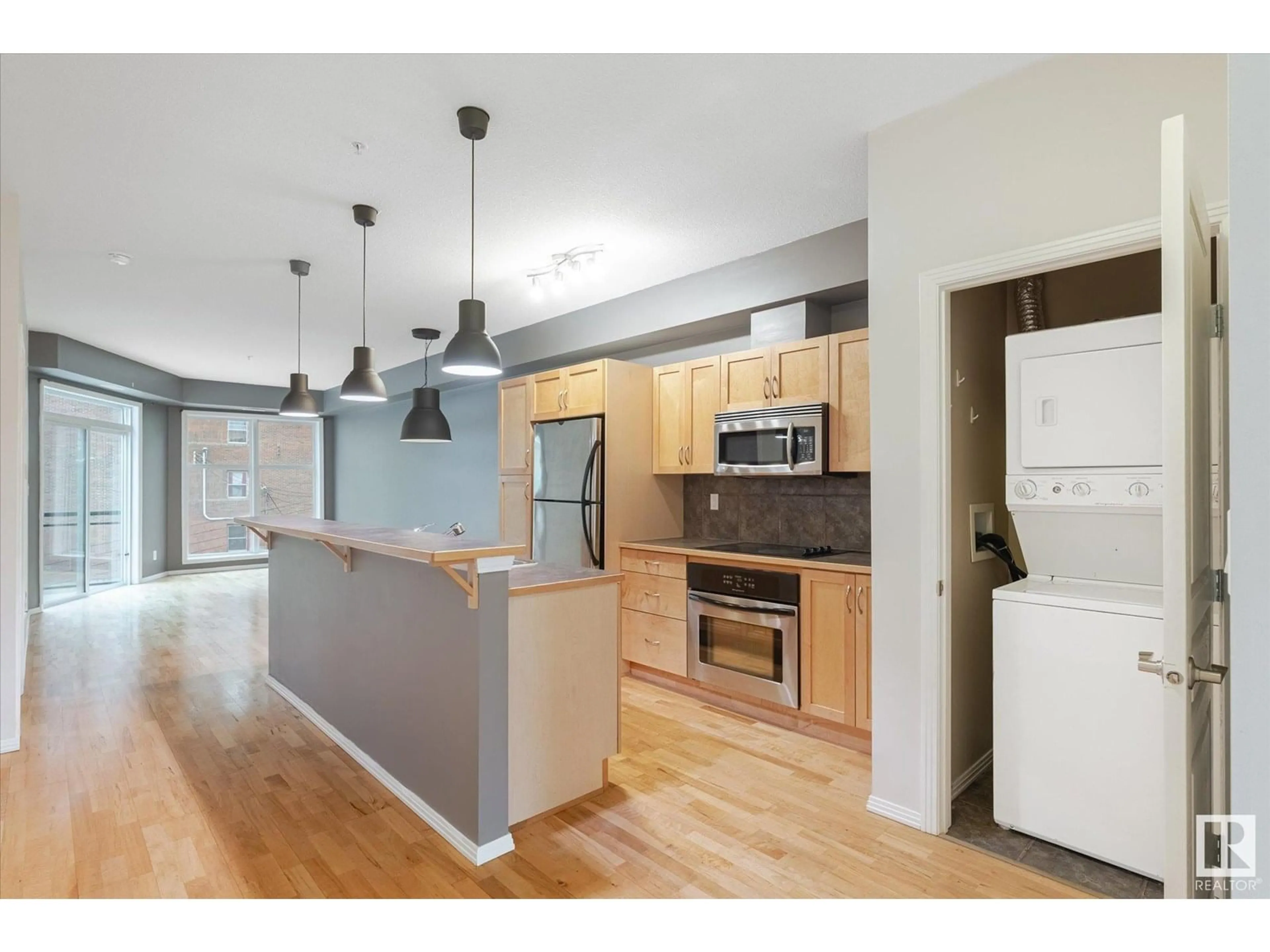 Open concept kitchen, wood/laminate floor for NW - 511 10503 98 AV, Edmonton Alberta T5K0B2