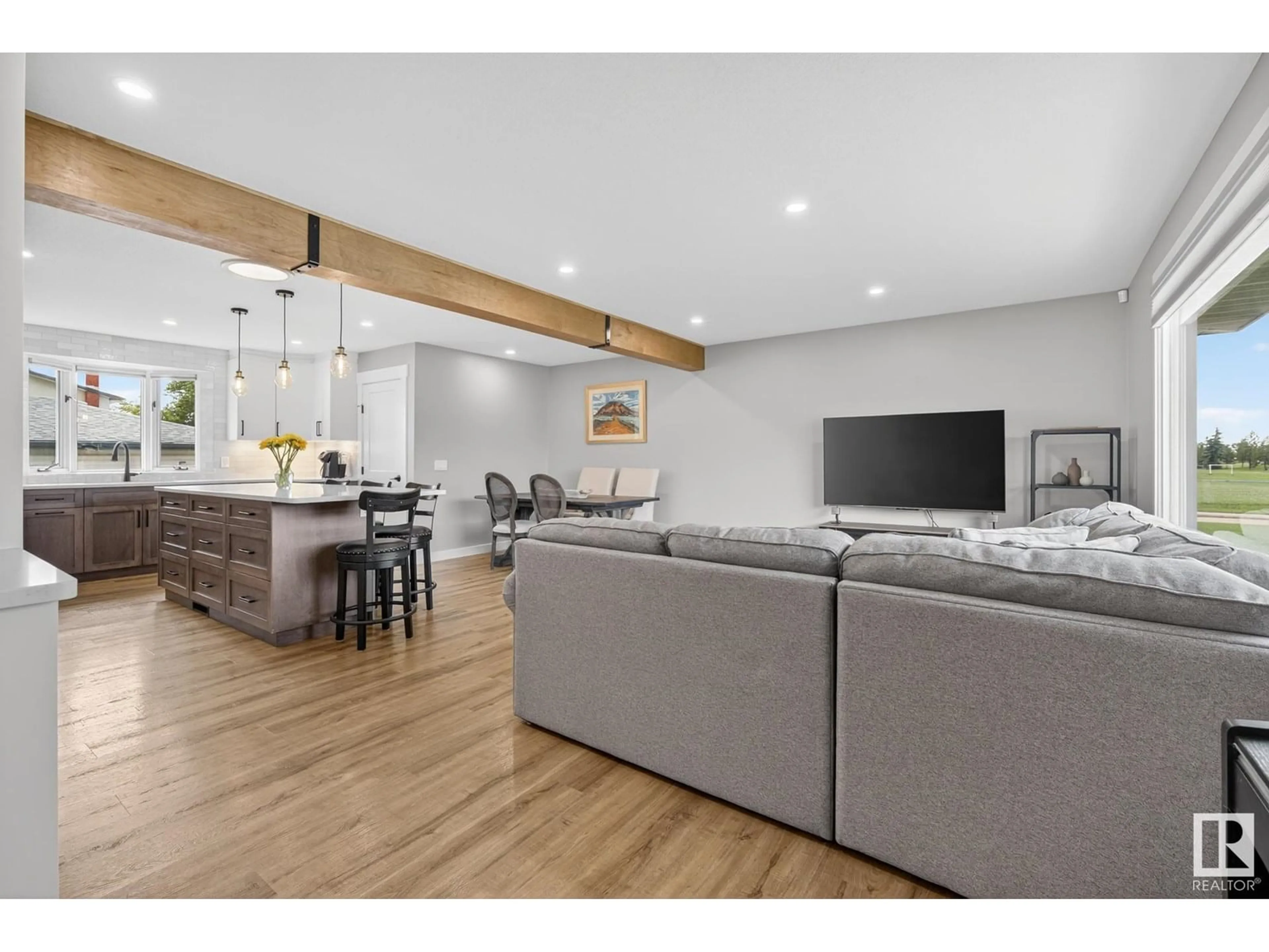 Open concept kitchen, wood/laminate floor for NW - 3628 107 ST, Edmonton Alberta T6J1B1