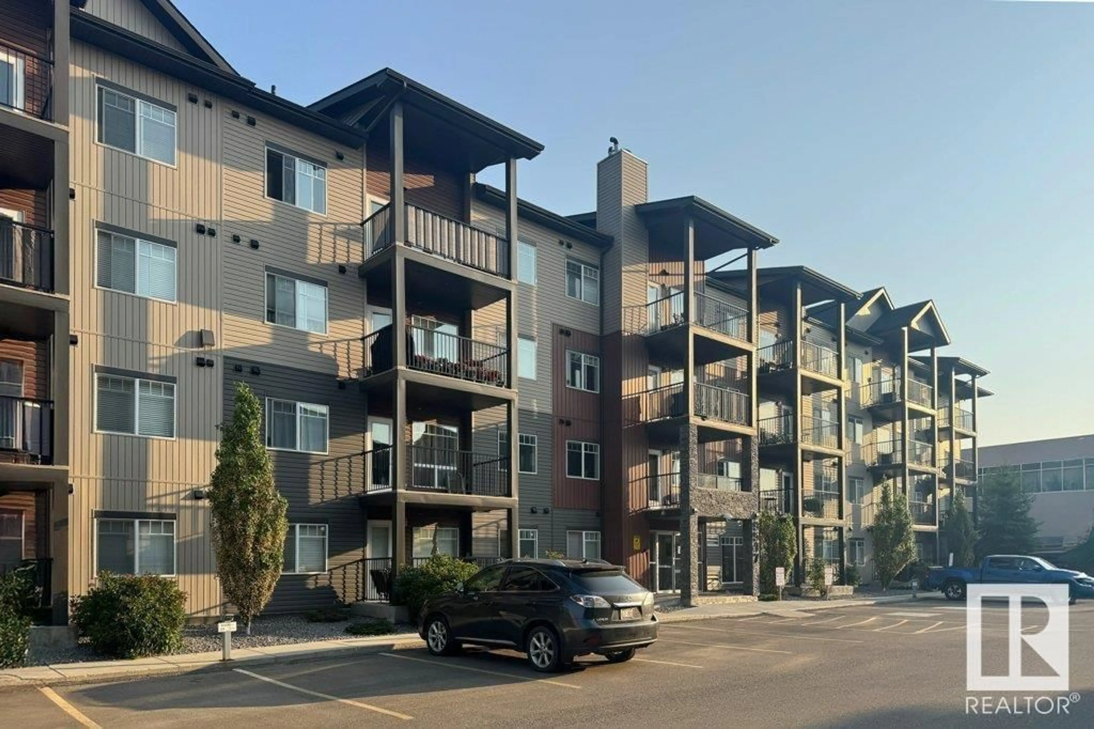 A pic from outside/outdoor area/front of a property/back of a property/a pic from drone, street for #212 - 9517 160 AV, Edmonton Alberta T5Z0N1