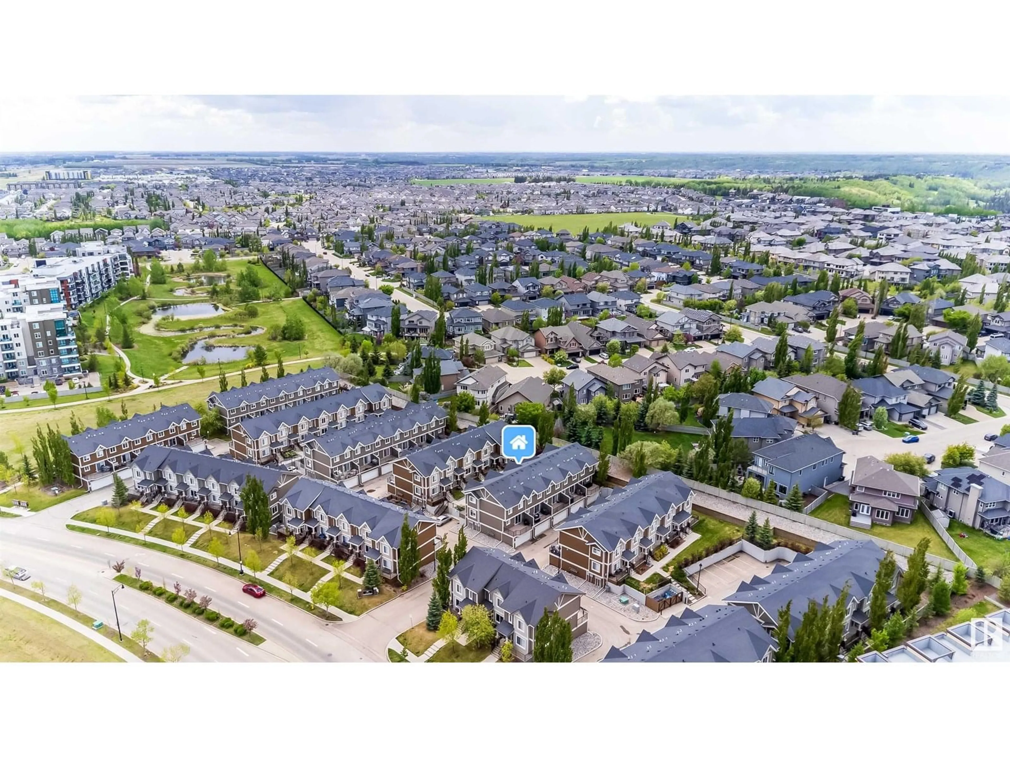 A pic from outside/outdoor area/front of a property/back of a property/a pic from drone, street for 1150 - 20 WINDERMERE WY, Edmonton Alberta T6W2B6